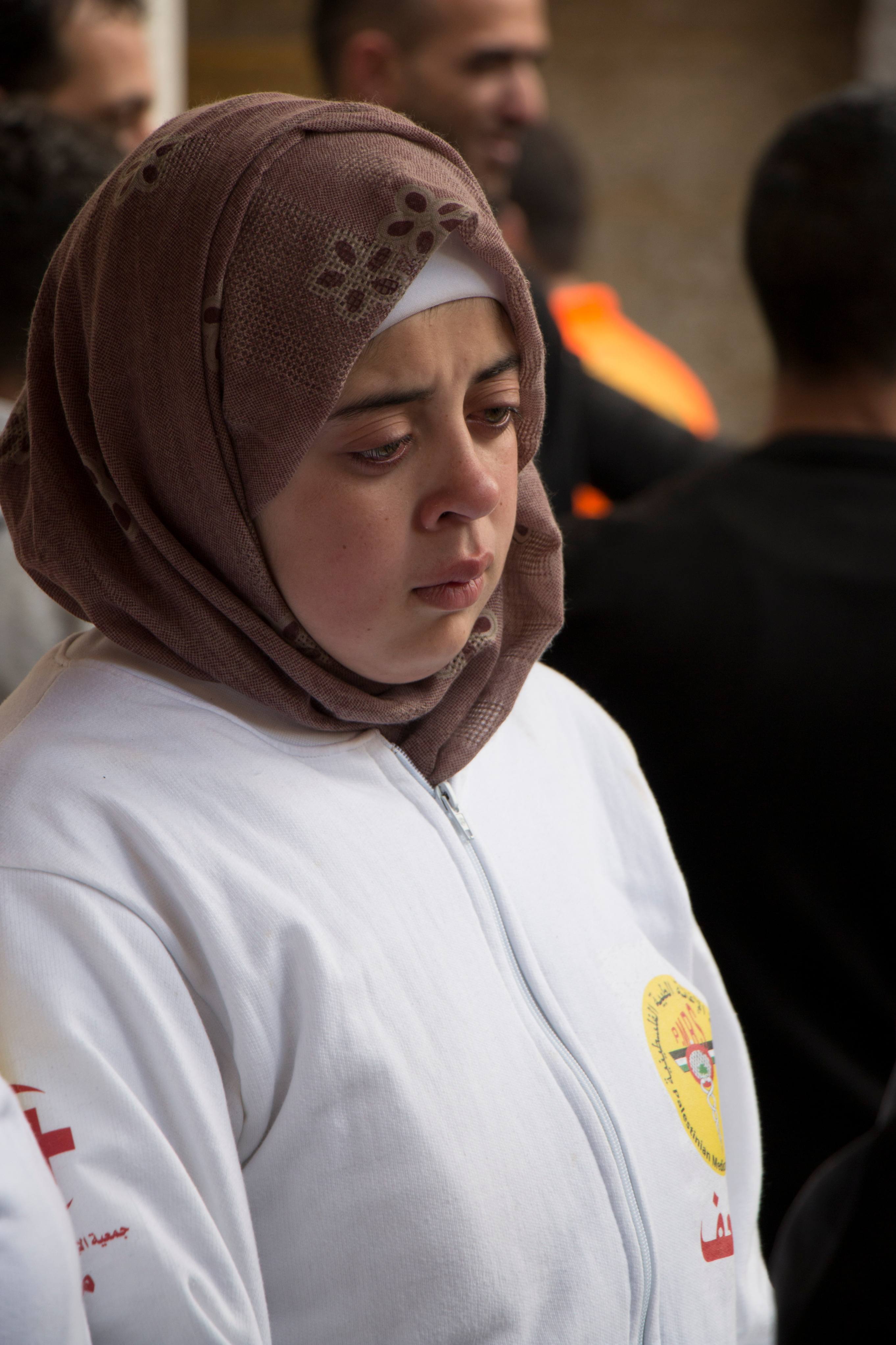 “You could have put him in clashes on his own, and he would have been able to care for all the injured by himself,” says Salsabil al-Tamimi of her friend and fellow paramedic Sajid Mizher (MEE/Akram al-Waara)