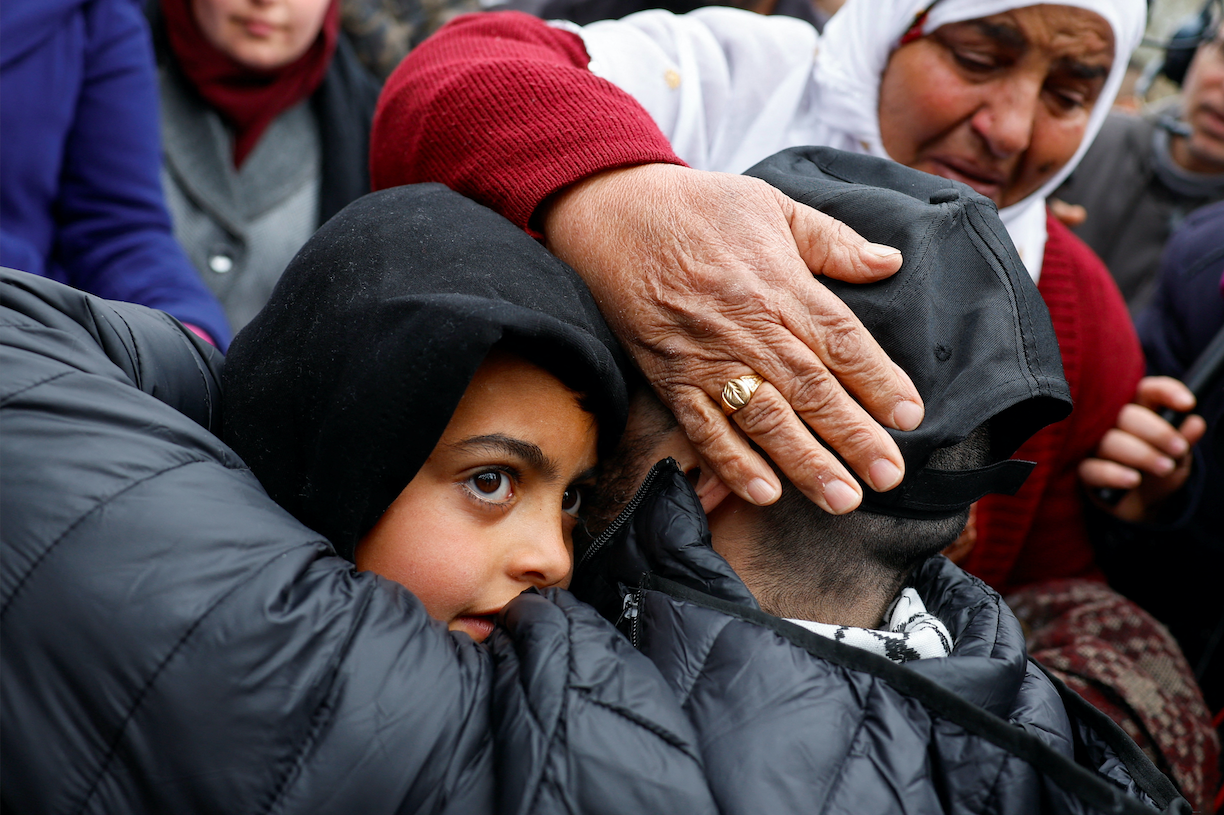 A freed Palestinian prisoner is greeted in Ramallah after being released from an Israeli jail as part of a ceasefire deal in Gaza. (Reuters/Mohammed Torokman)
