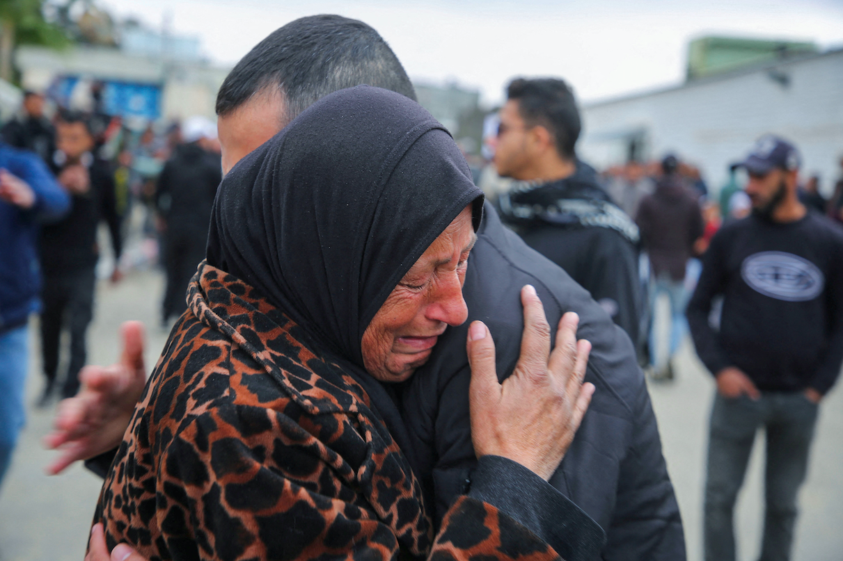 A woman cries in Khan Younis in the southern&nbsp;Gaza&nbsp;Strip as Palestinian prisoners are greeted after being released from an Israeli jail (Hatem Khaled/Reuters)
