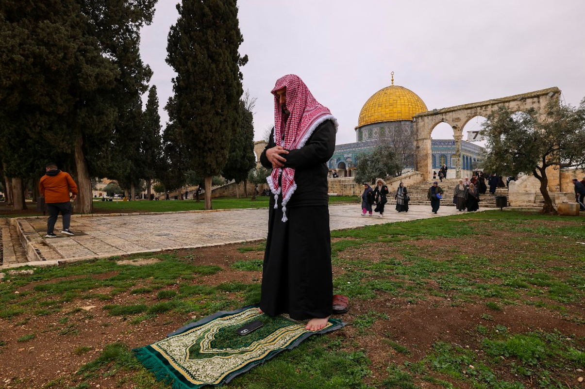 Muslim worshippers attend the first Friday prayers of Ramadan, in Al-Aqsa compound, also known to Jews as Temple Mount, in Jerusalem's Old City, March 7, 2025. (REUTERS/Ammar Awad)