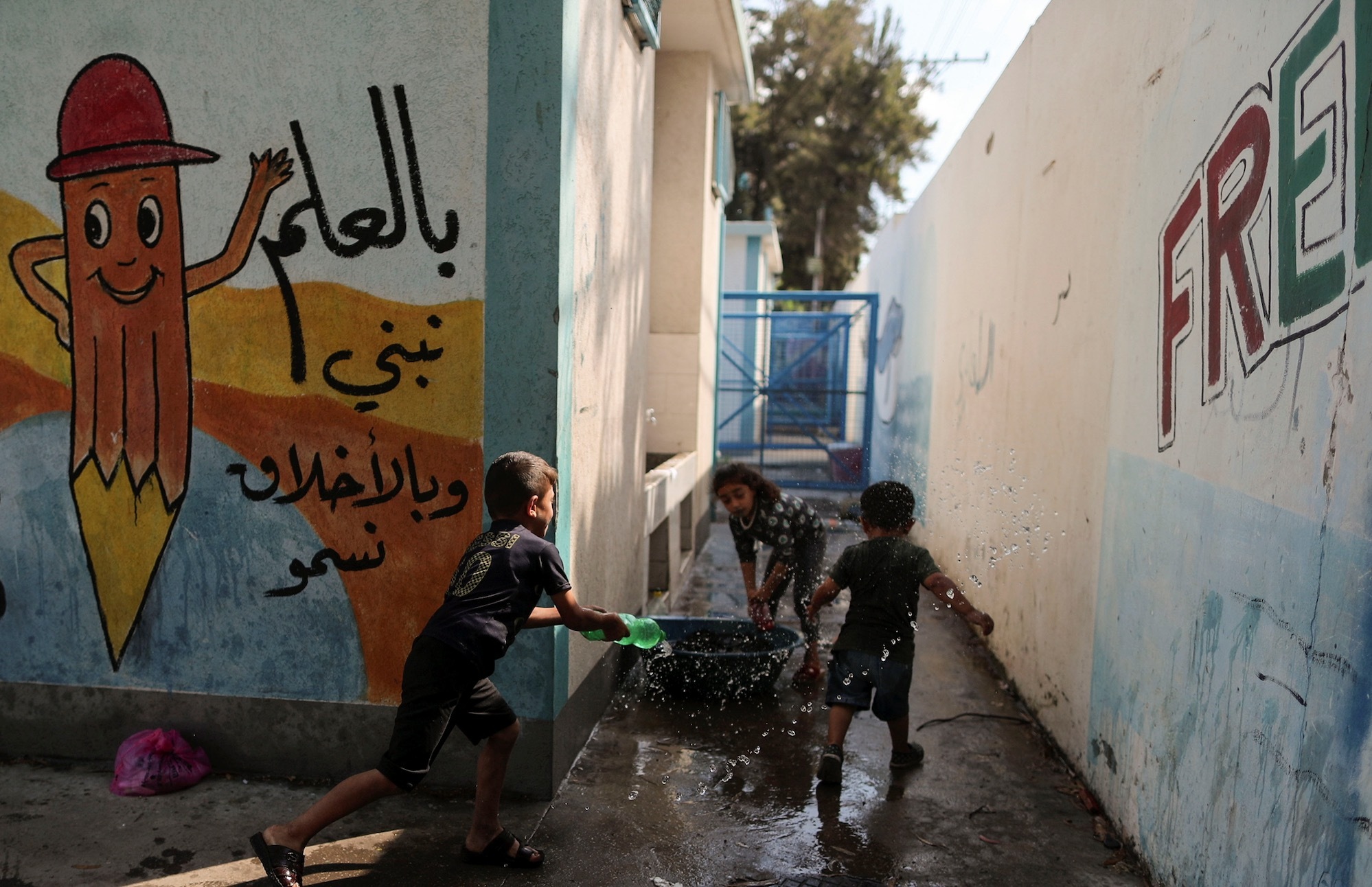 Palestinian children play in a UNRWA school in Gaza (Reuters)