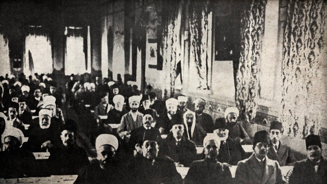 A photograph of the World Islamic Congress in Jerusalem in 1931, attended among others by Muhammad Iqbal and Hassan al-Banna. Iqbal can be seen sitting on the far right. (Wikimedia Commons)