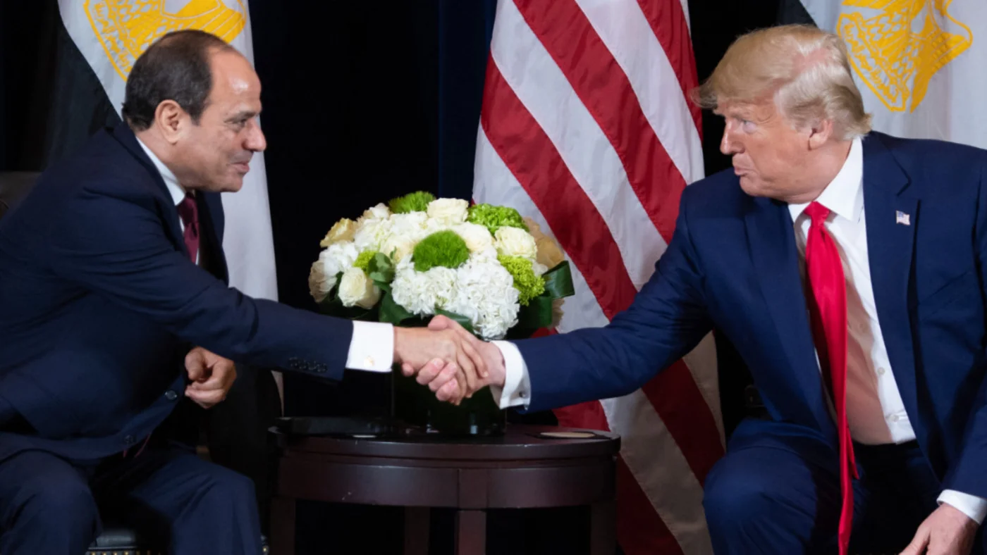 US President Donald Trump shakes hands with Egyptian President Abdel Fattah el-Sisi during a meeting on the sidelines of the UN General Assembly in New York on 23 September 2019 (Saul Loeb/AFP)
