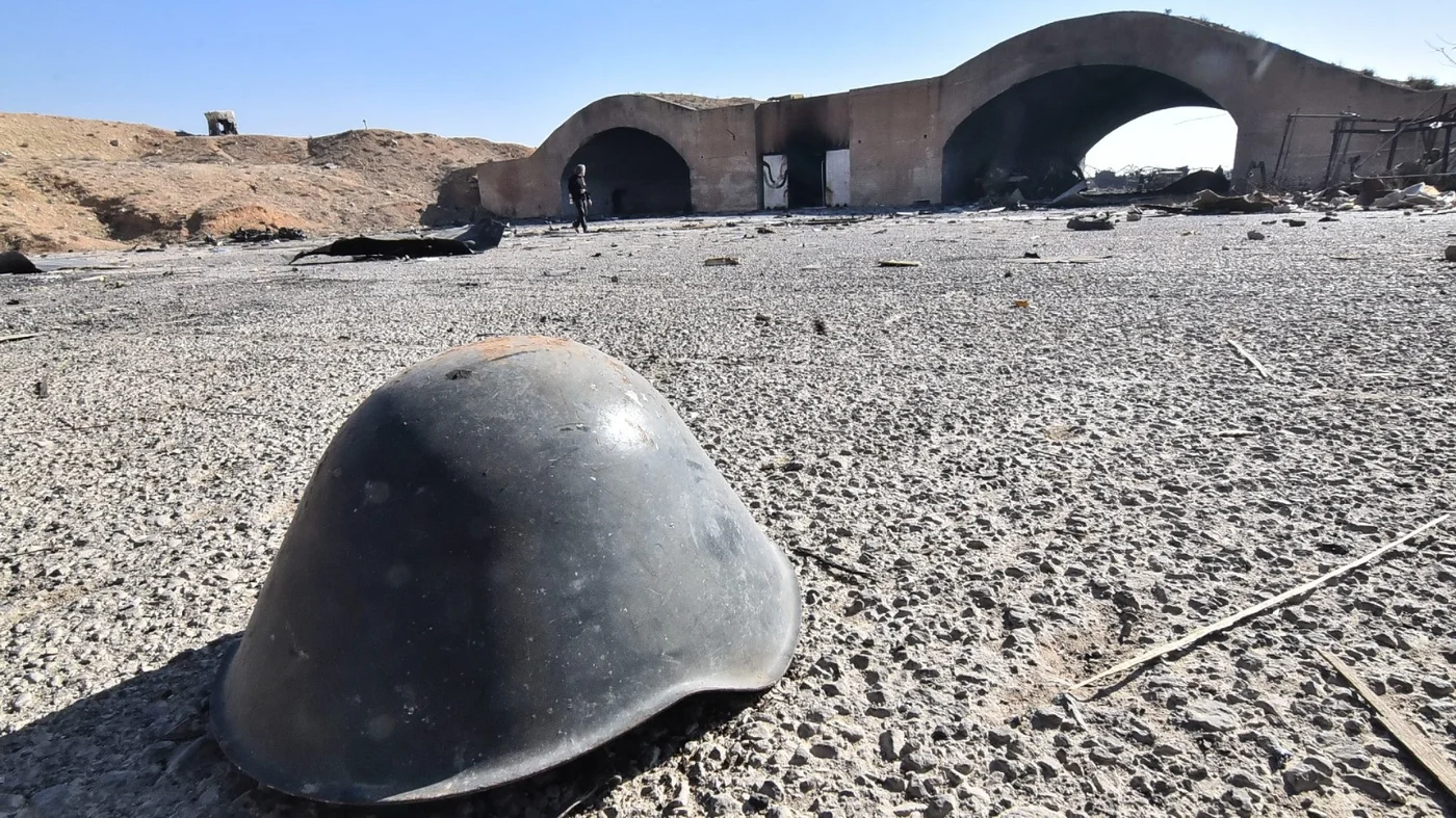 An abandoned helmet at the Mezzeh military airport in Damascus