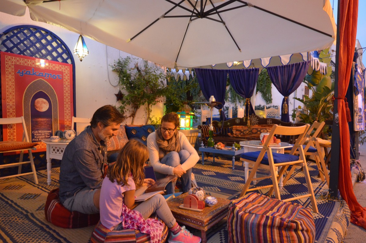 A family from northern Italy? peruse the menu at Th'am (Courtesy of Tha'am)