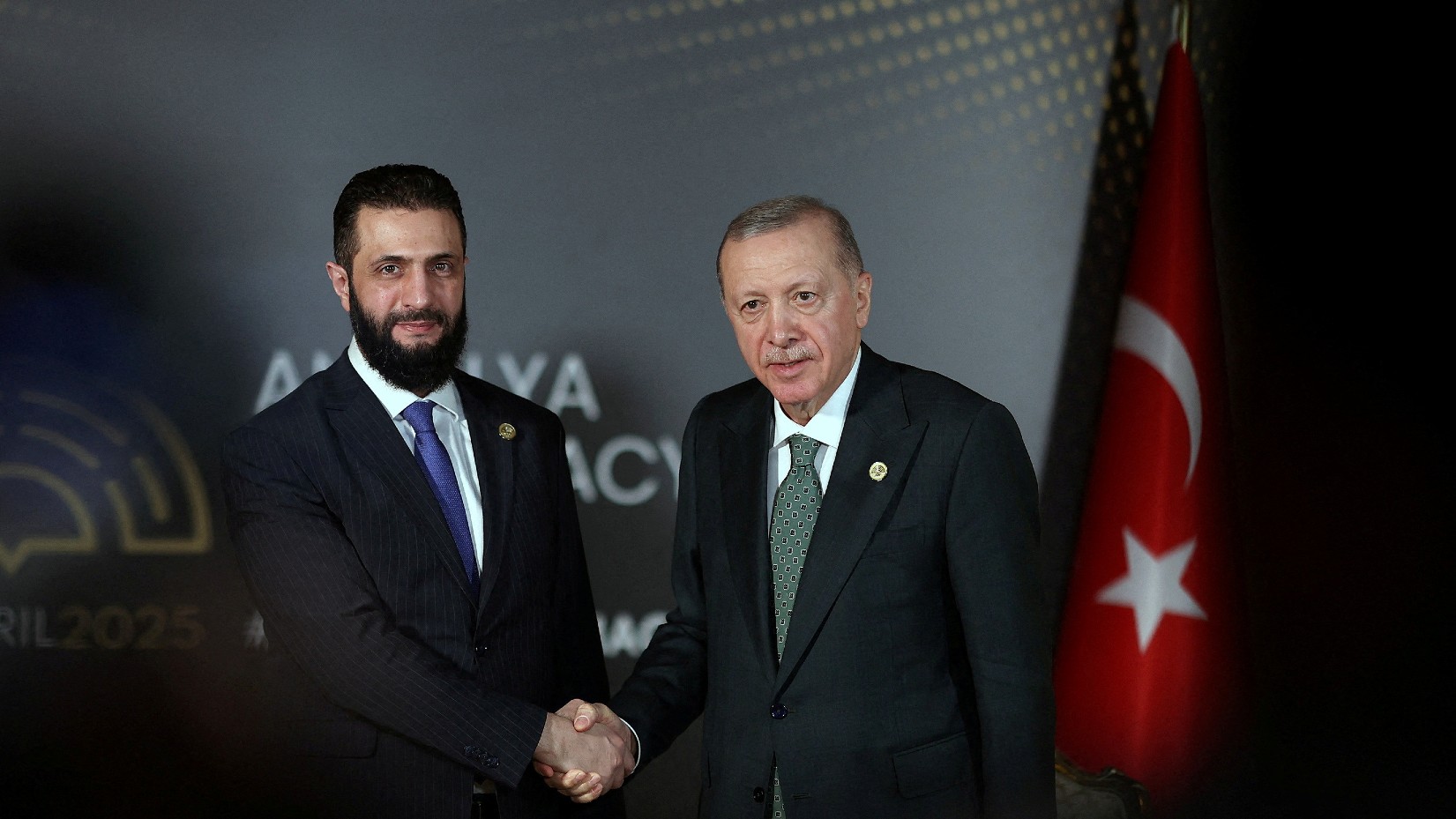 Turkey's President Tayyip Erdogan meets with Syria's interim President Ahmed al-Sharaa at Antalya Diplomacy Forum in Antalya, Turkey, April 11, 2025Turkey's President Tayyip Erdogan meets with Syria's interim President Ahmed al-Sharaa at Antalya Diplomacy Forum in Antalya, Turkey, April 11, 2025