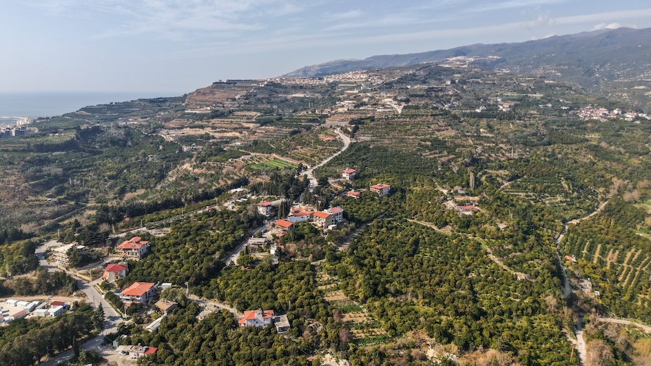 An aerial photo of Vakifli and Musa Dag (mountain), which was taken on 4 February 2025 (Fikret Can Kusadali / MEE)