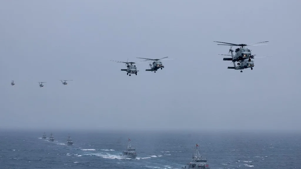 Turkish Navy helicopters and ships on military exercises in the Mediterranean Sea near Antalya on 9 April (AFP/Adem Altan)