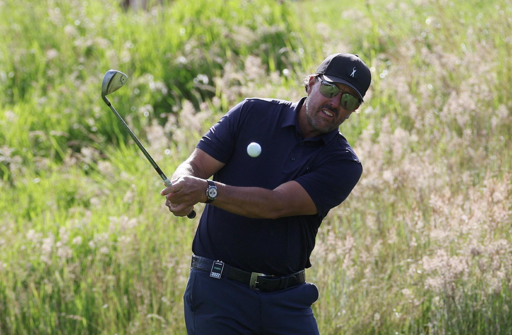 Phil Mickelson plays a shot during Saturday's third round (Reuters)