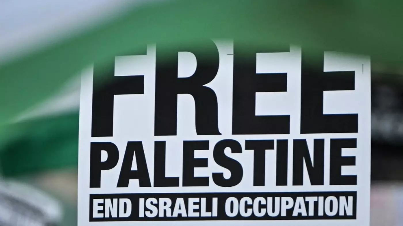 A protest placard is pictured in central London on 8 June 2024