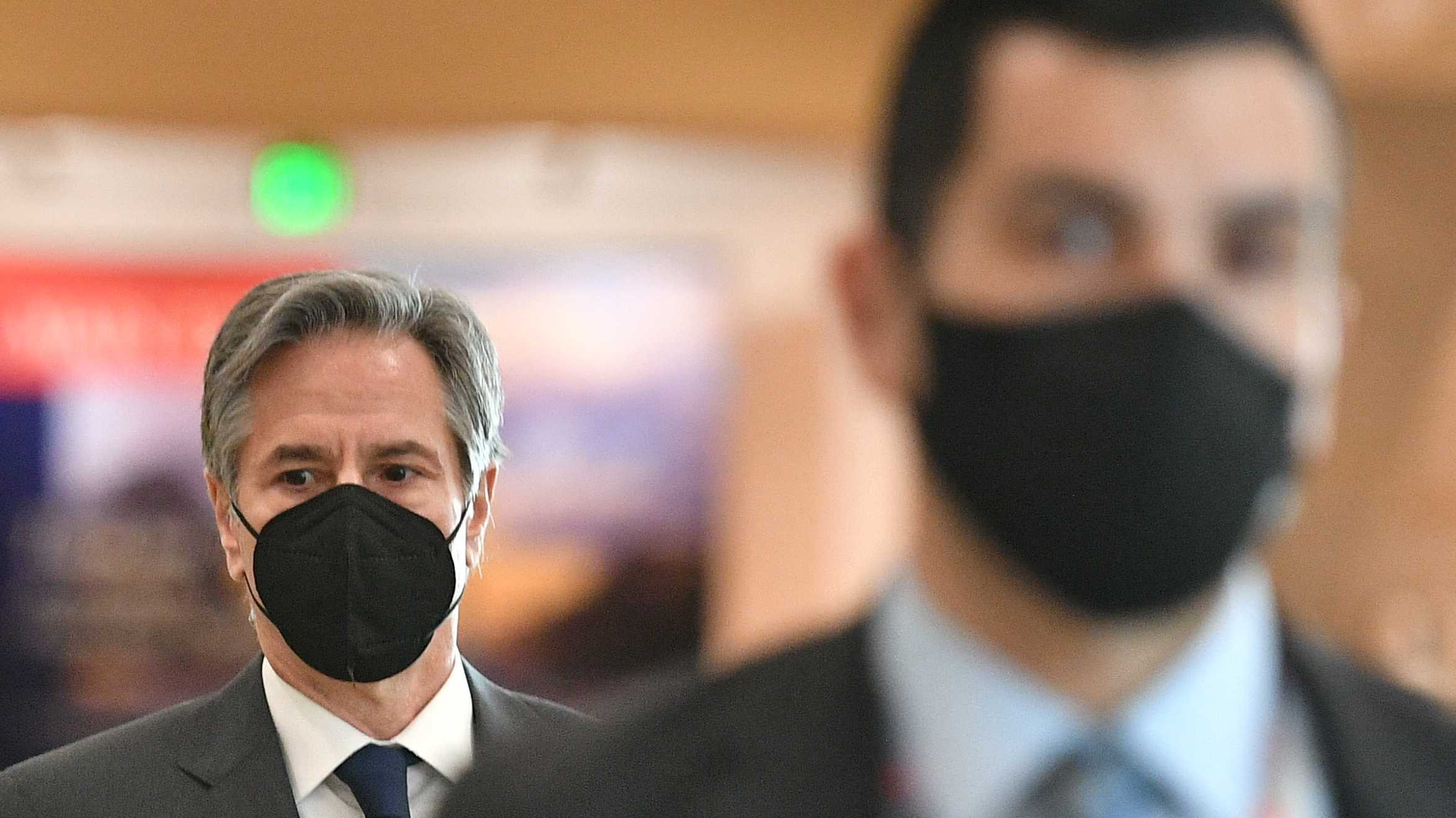 US Secretary of State Antony Blinken (L) departs after briefing the Senate Armed Services and Senate Foreign Relations committees on Afghanistan at the US Capitol in Washington, DC, on February 2, 2022.
