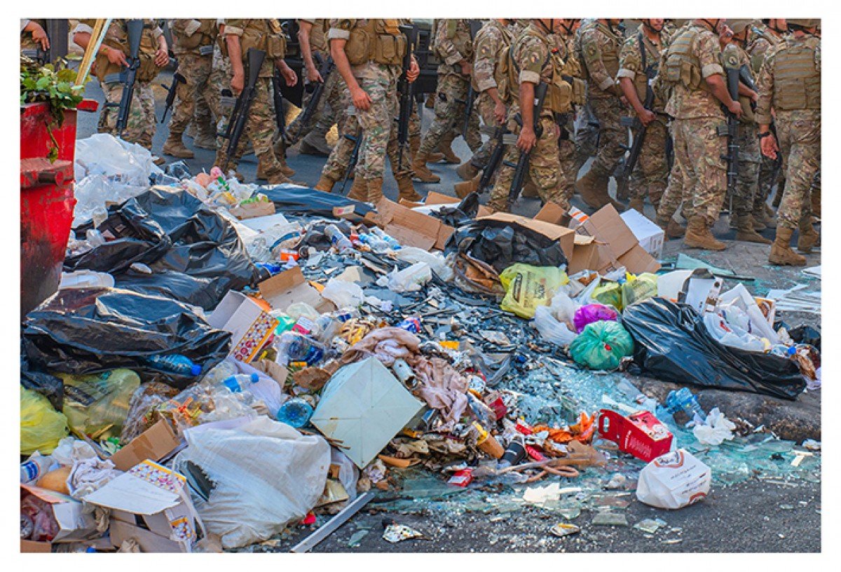 Rubbish, blast residue, and Lebanese troops are seen adjacent a demonstration south of Martyrs Square in downtown Beirut. (Vladimir Antaki)