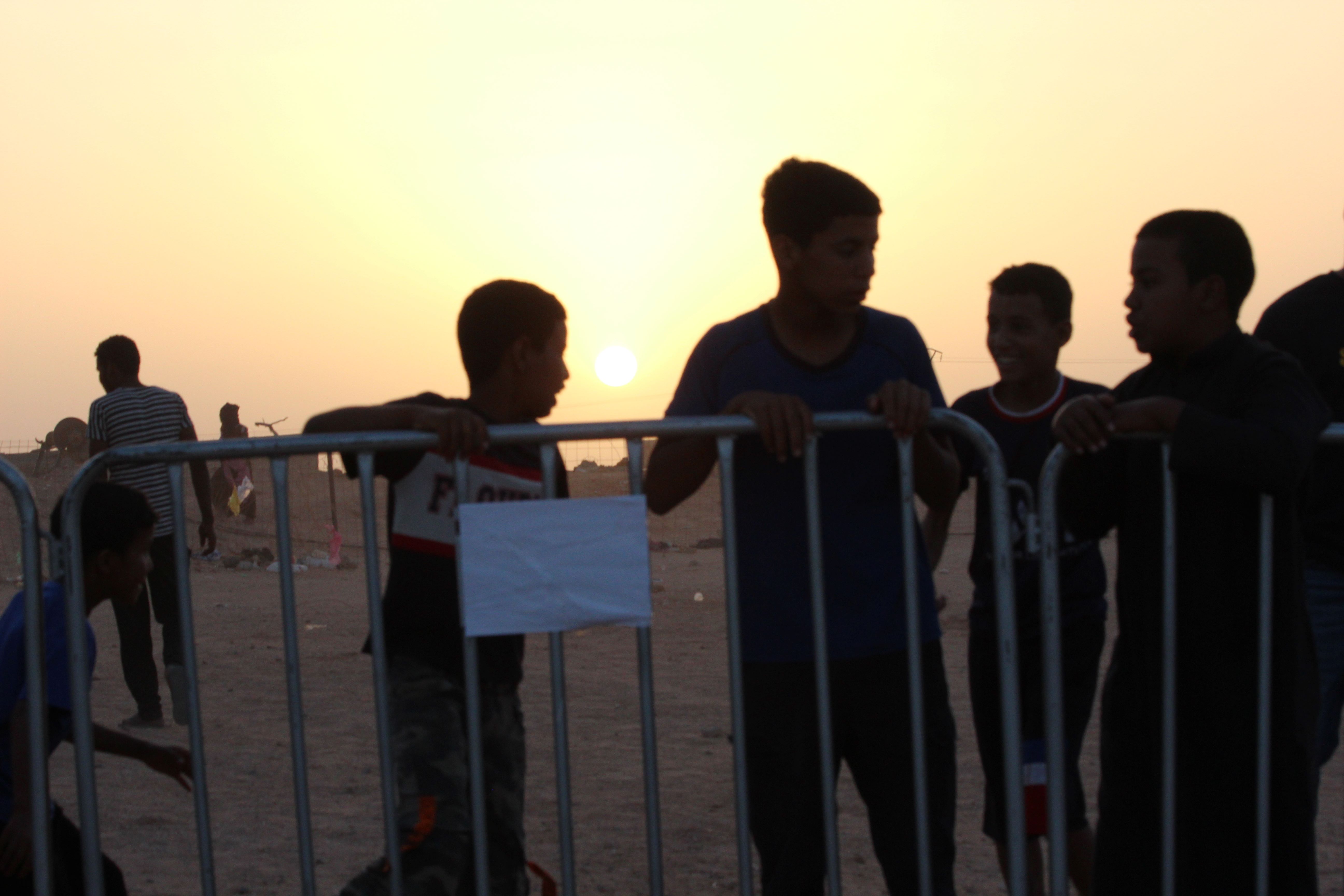 Children play in the middle of Ausserd refugee camp during the FiSahara International Film Festival (MEE/Alex MacDonald)