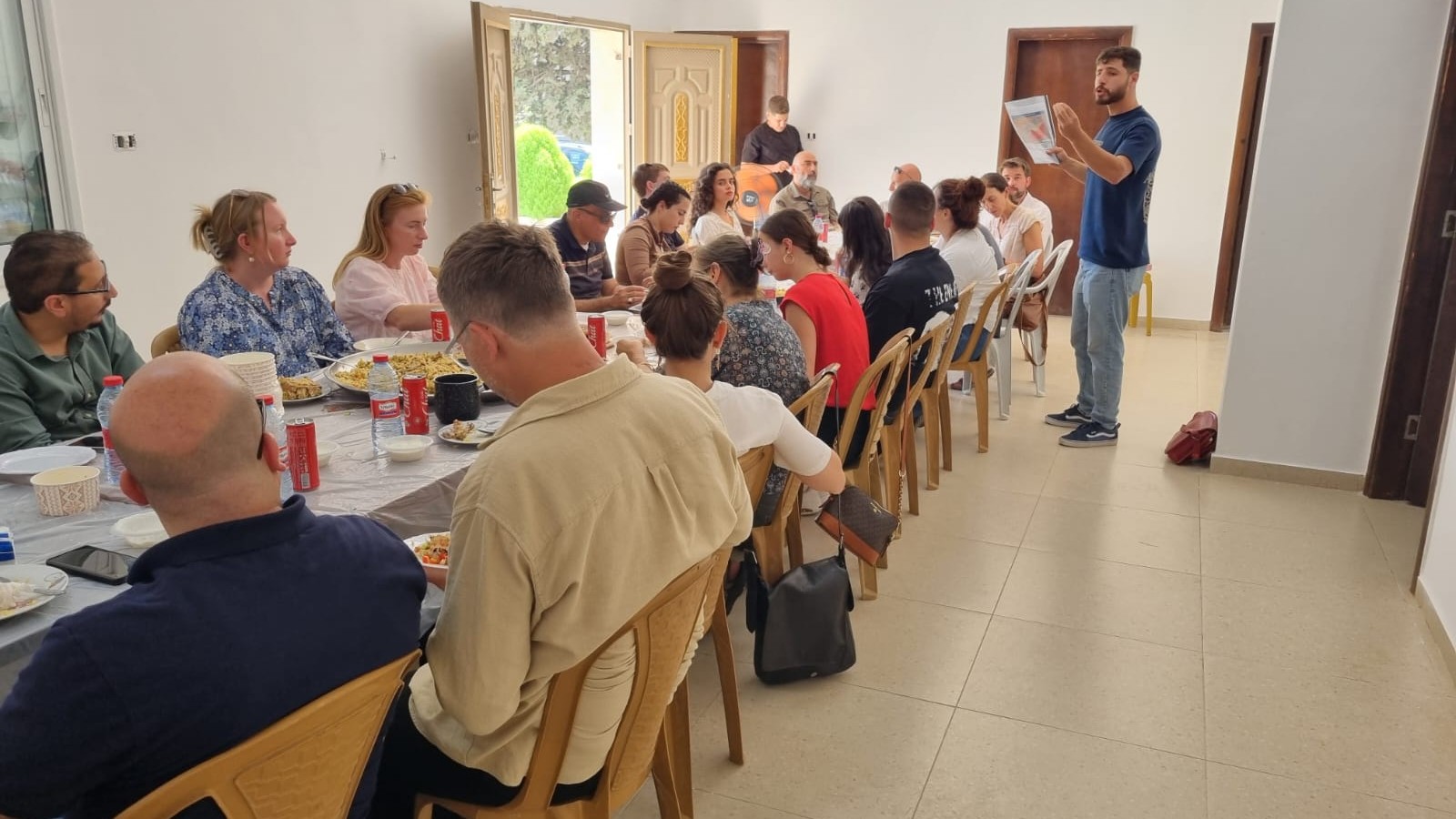 Activists sitting and eating at the Youth of Sumud centre (supplied)