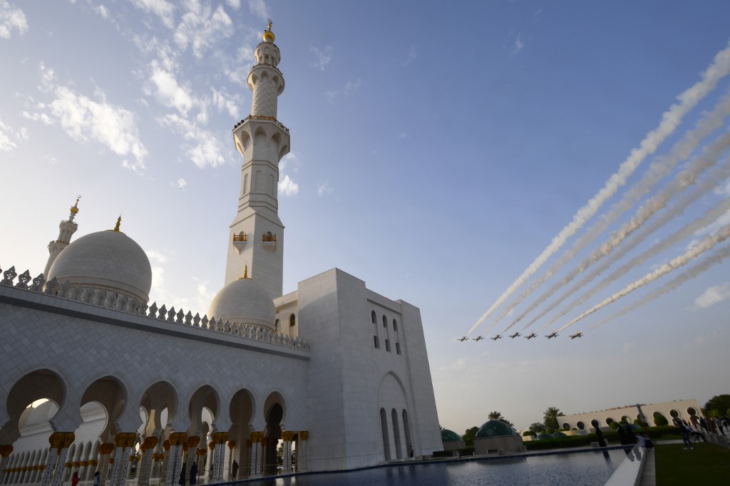 Jets fly over the Sheikh Zayed Grand Mosque in Abu Dhabi in 2018 (AFP)