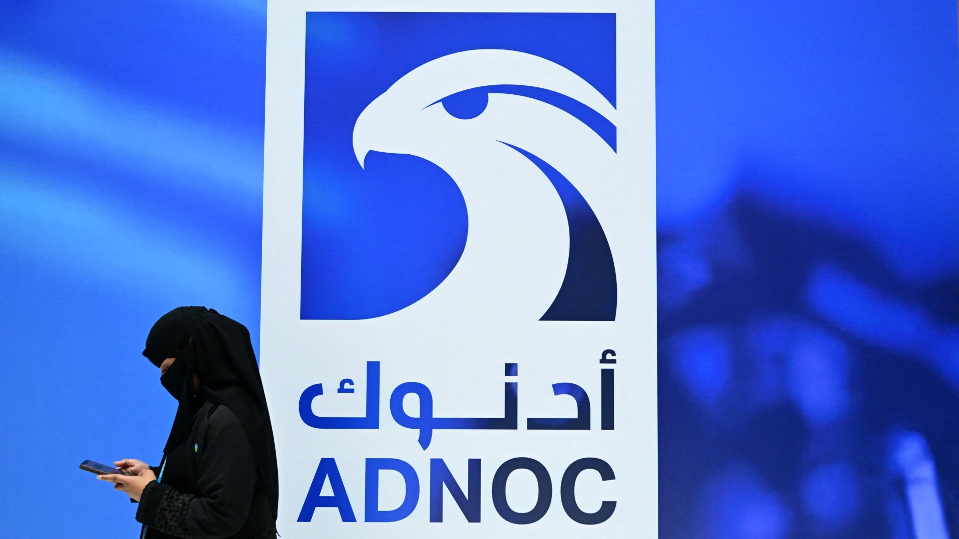 ADNOC logo on its booth at the ADIPEC conference in Abu Dhabi in November 2025 (Giuseppe Cacace / AFP)