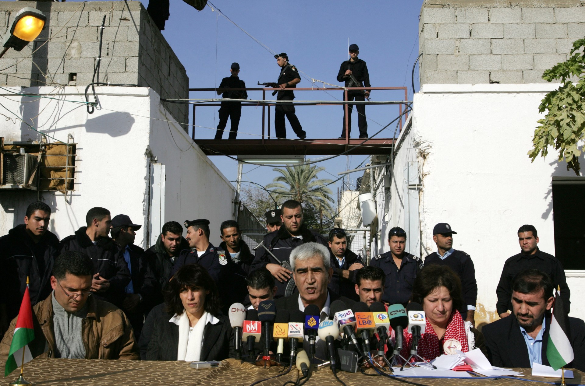 Ahmed Sadat launches his election campaign on 3 January 2006, from the grounds of a Jericho-based jail in the occupied West Bank under heavy police guard (AFP/Awad Awad)
