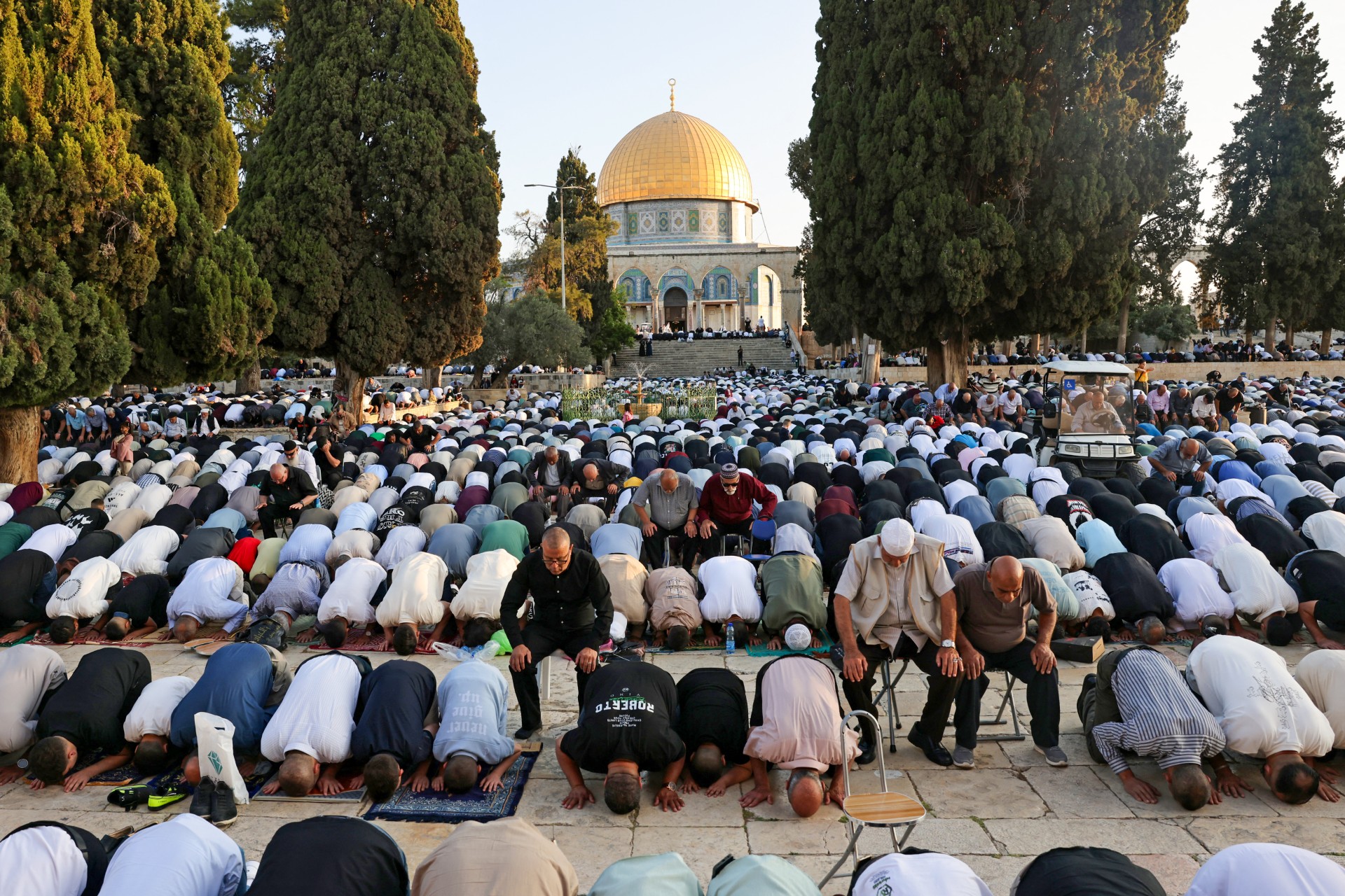 Muslims participate in Eid al-Adha prayers at the Al-Aqsa Mosque compound in occupied East Jerusalem on 6 June 2025 (AFP/Ahmad Gharabli)