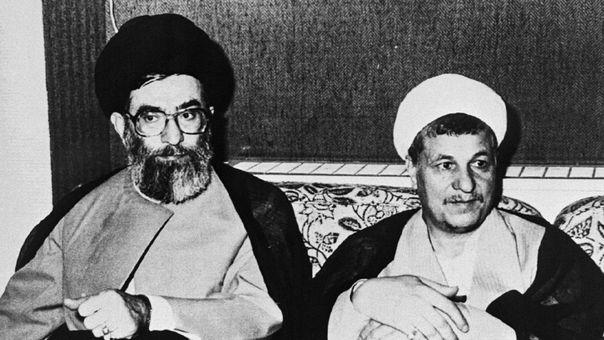 Acting commander-in-chief of the Iranian Armed Forces Akbar Hashemi Rafsanjani (R) and Iranian President Ali Khamenei in 1988 (IRNA via AFP)