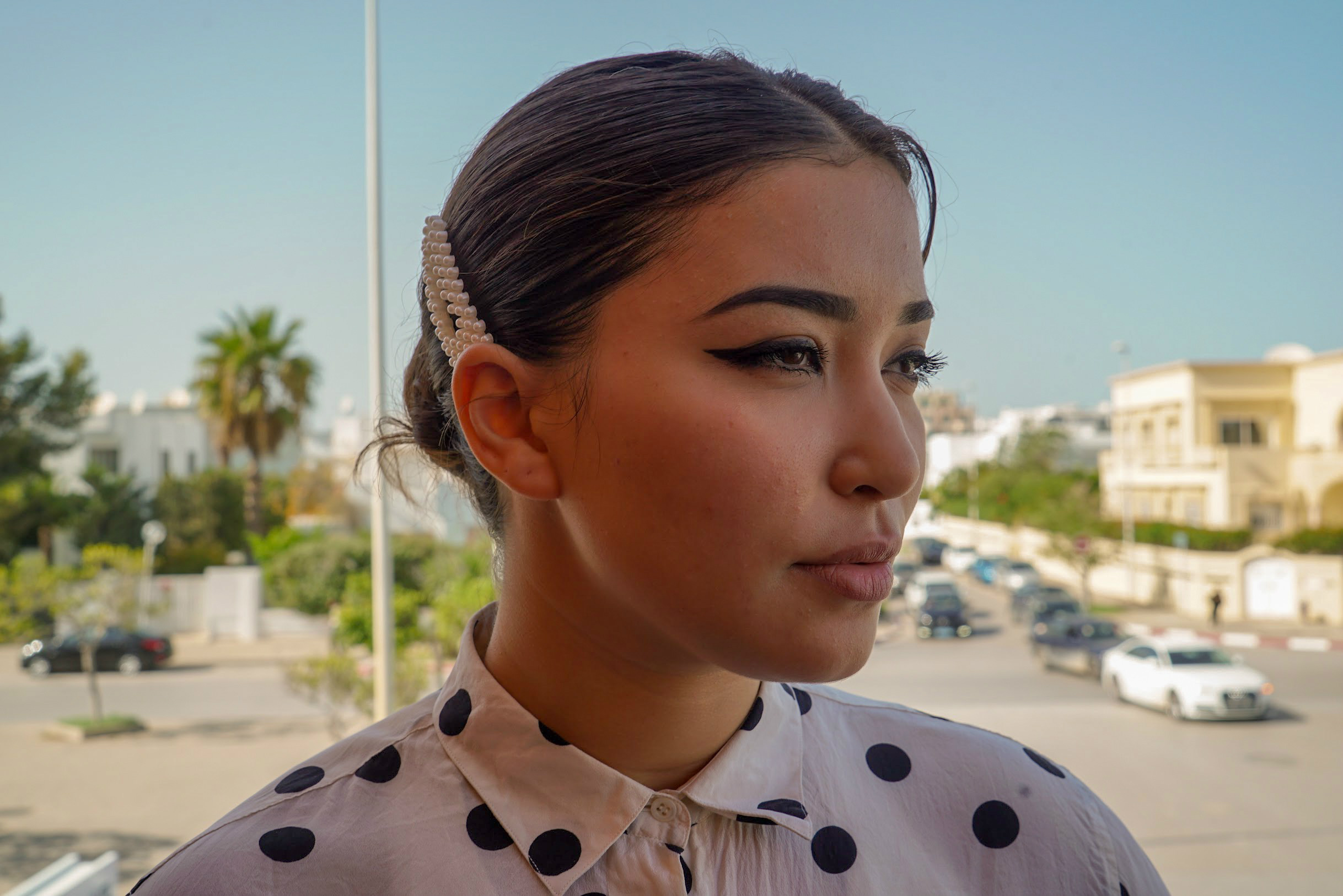 Balkis Ghozlany told MEE that with the economy lagging, many Tunisians were looking at pre- and anti-revolution politicians for answers (MEE/Faisal Edroos)