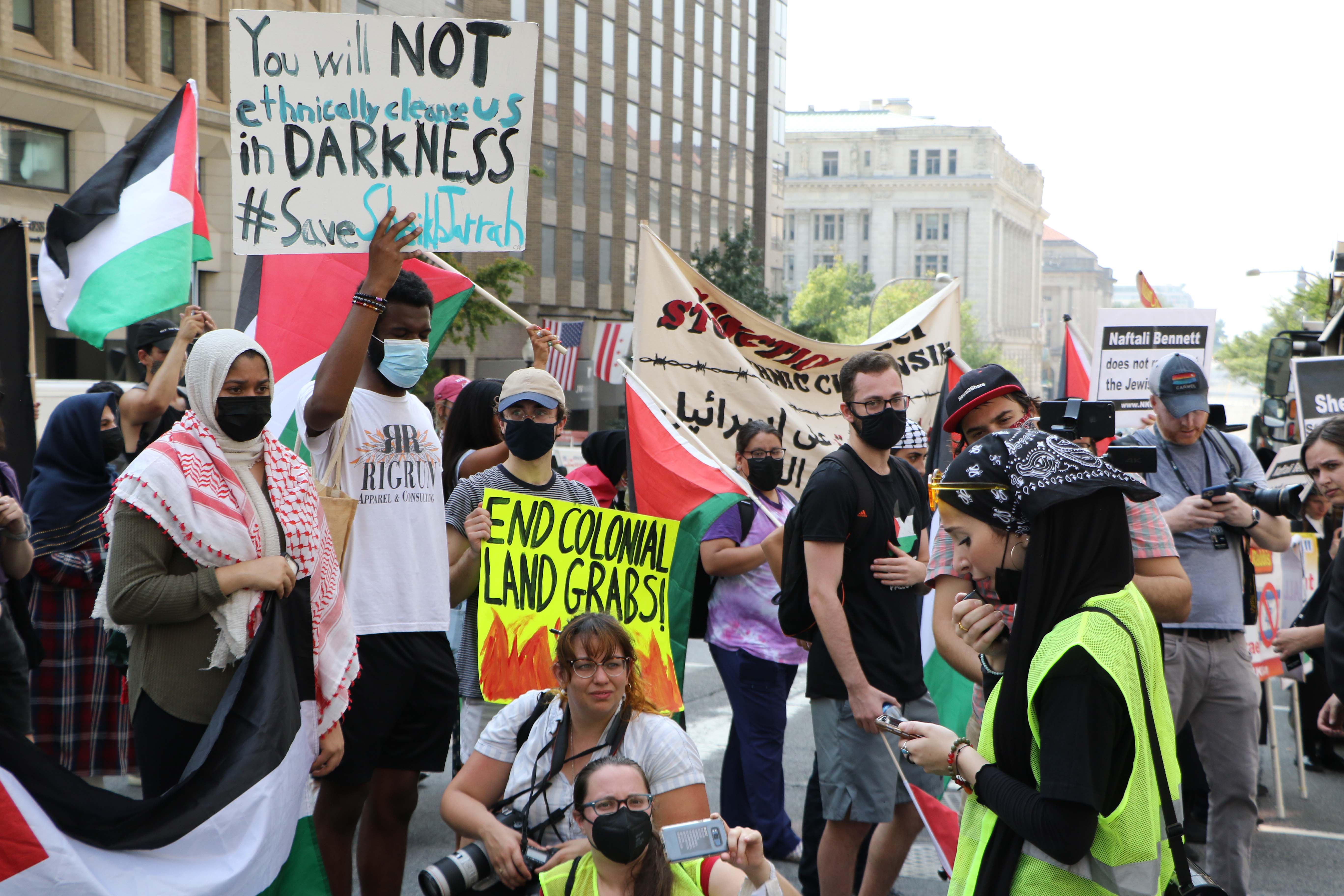 Protesters rally together after marching around downtown Washington.
