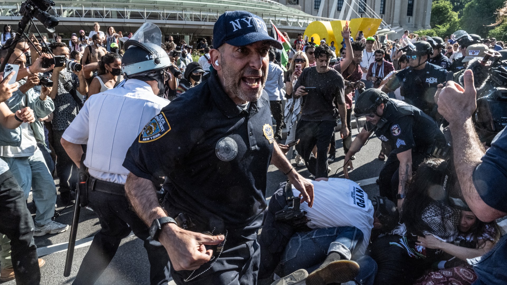 NEW YORK, NEW YORK - MAY 31: Members of the NYPD detain a person at the Brooklyn Museum where Pro-Palestinian demonstrators associated with the 'Within Our Lifetime' protest group rallied on May 31, 2024 in New York City. Demonstrators started at Barclays Center and marched to the Brooklyn Museum where they occupied the inside lobby and the outside demanding that the Brooklyn Museum divest from investments in Israel. Stephanie Keith/Getty Images/AFP STEPHANIE KEITH / GETTY IMAGES NORTH AMERICA / Getty Image