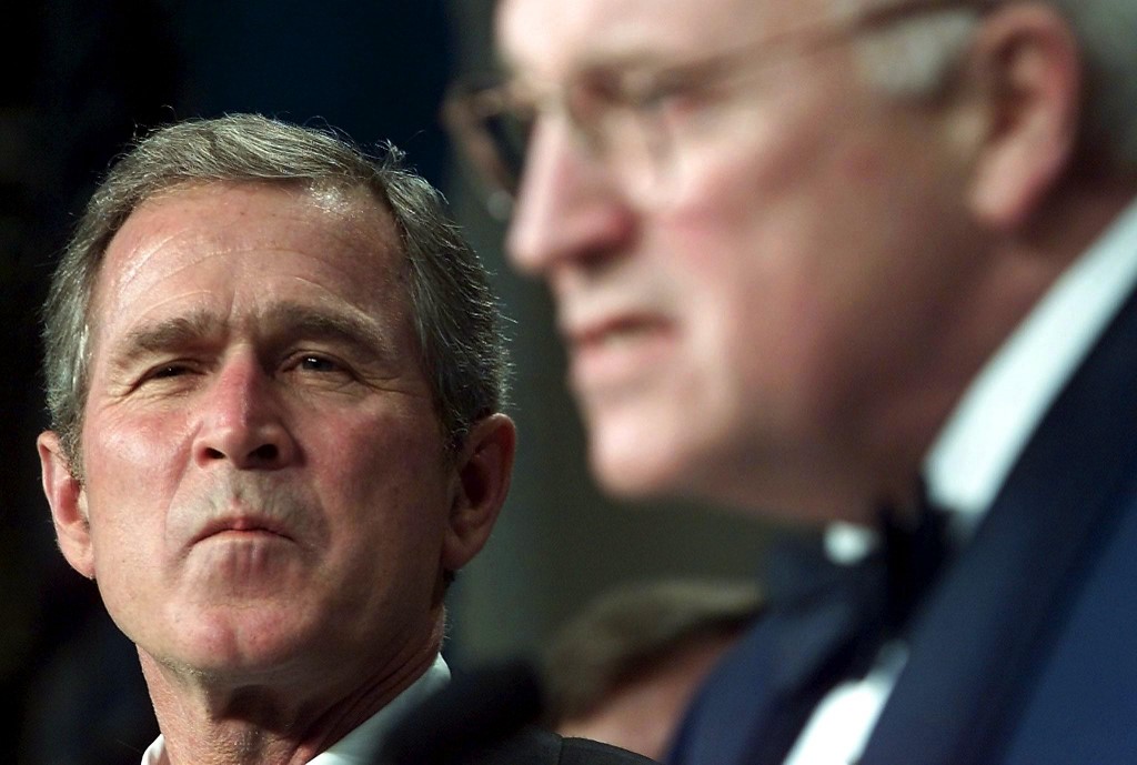 US President-elect George W. Bush (L) is introduced by Vice President-elect Richard B. Cheney at the Texas State Black Tie and Boots Ball at the Marriott Wardman Park 19 January, 2001, 