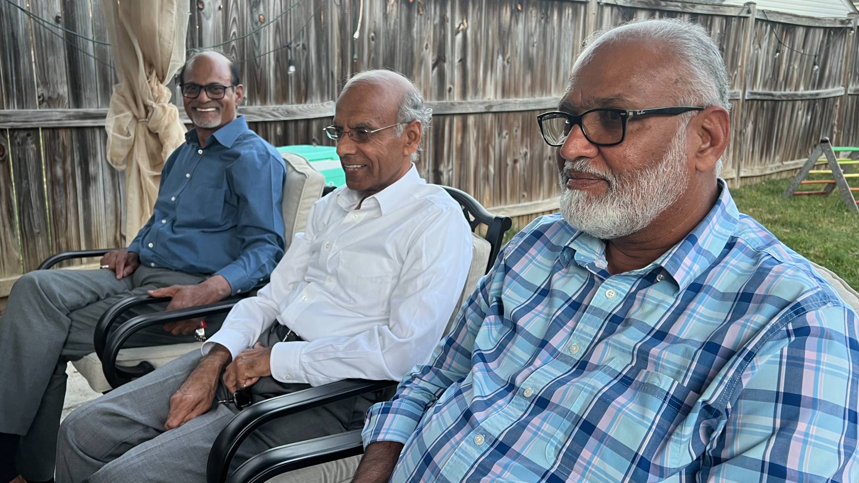 Left to right: Tahir Huppal, Iftikhar Ahmad and Shakeel Ahmed have worked in Washington DC's cab industry for decades (Umar Farooq/MEE)