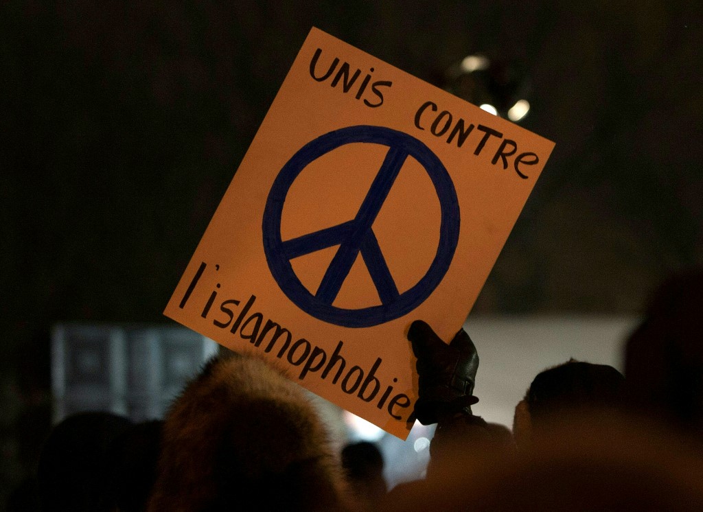 A sign reads: “United against Islamophobia” during a 2017 rally in Quebec City (AFP)