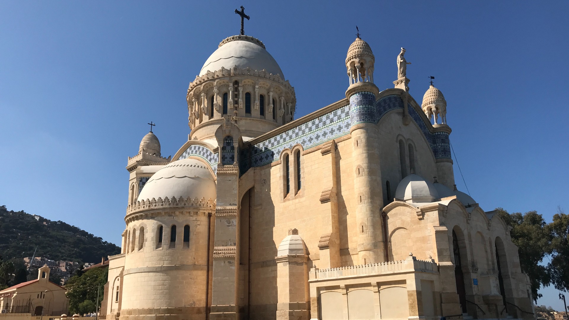 The Catholic basilica sits on a hilltop on the eastern side of the city (MEE/Abdunour Berrah)