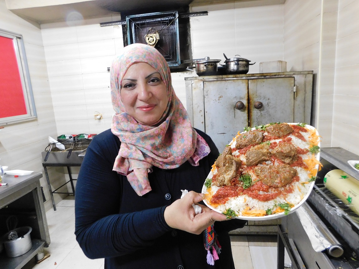chef holding egyptian fattah