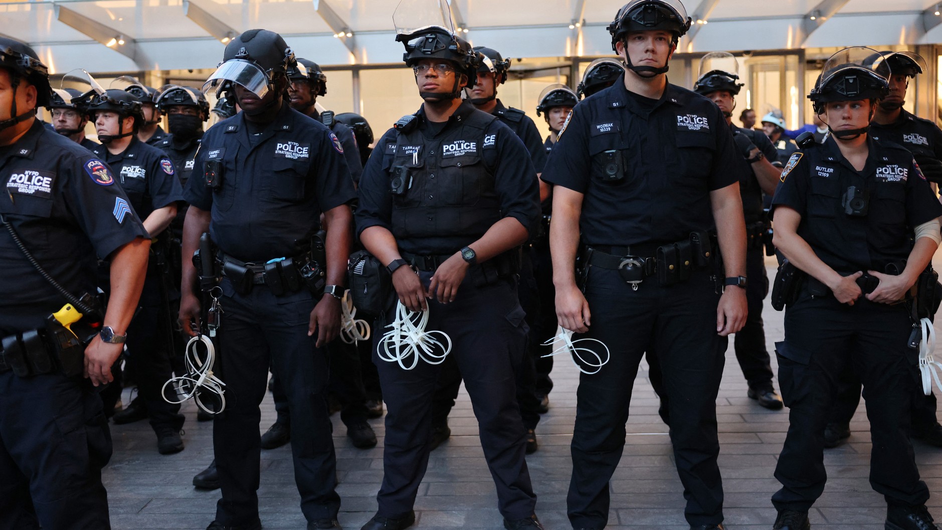 NYPD officers prepare to arrest people attempting to occupy the outside of Citibank headquarters while they participate in a 'Climate Justice Means Free Palestine!' rally on June 18, 2024 in New York City (Michael M. Santiago/Getty Images/AFP)
