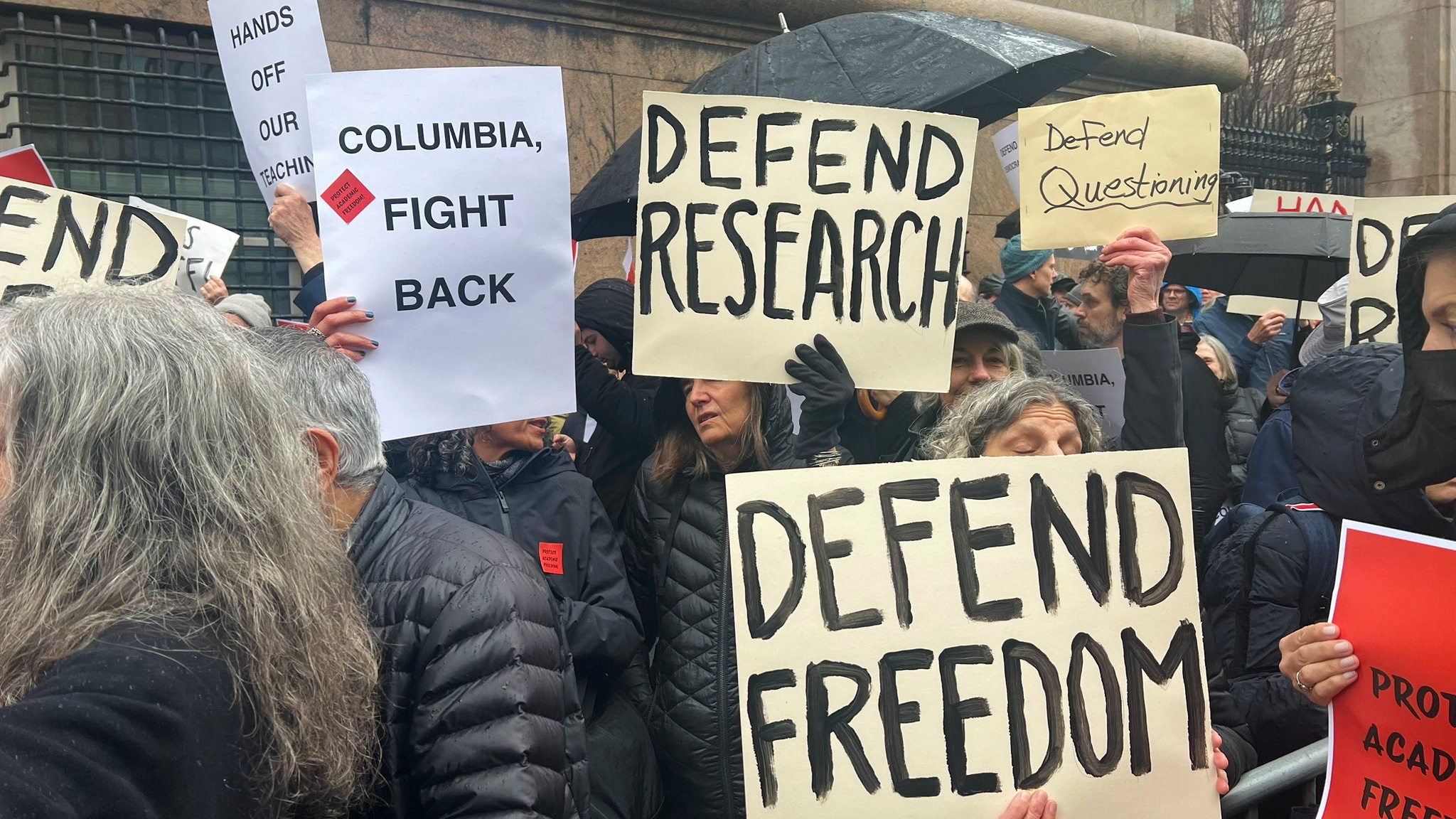 Some of the placards at the faculty protest on 24 March 2025 (MEE/Azad Essa)