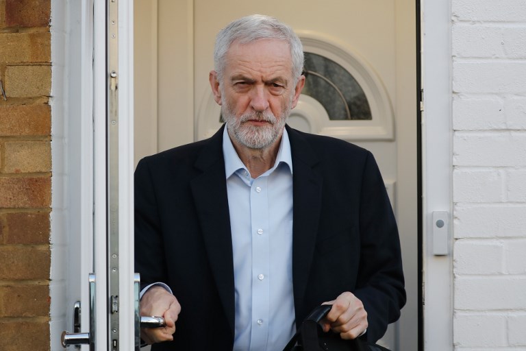 Labour leader Jeremy Corbyn leaves his London home on 26 February (AFP)