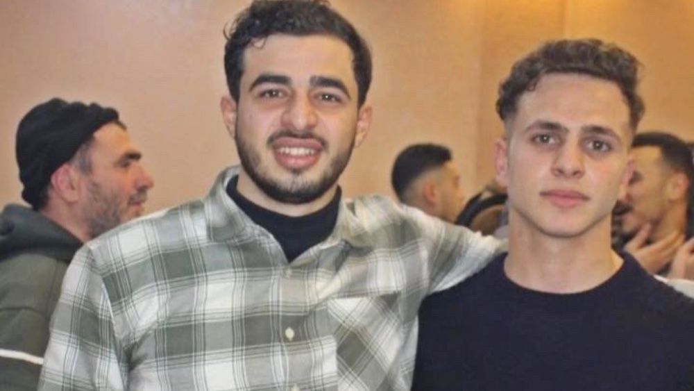 Wadea Ziada (left) and Ahmad al-Safeen, pictured before the war in Gaza; both were killed in an Israeli drone strike, and their uncle Yahya al-Saafein (back left) was killed a week later.