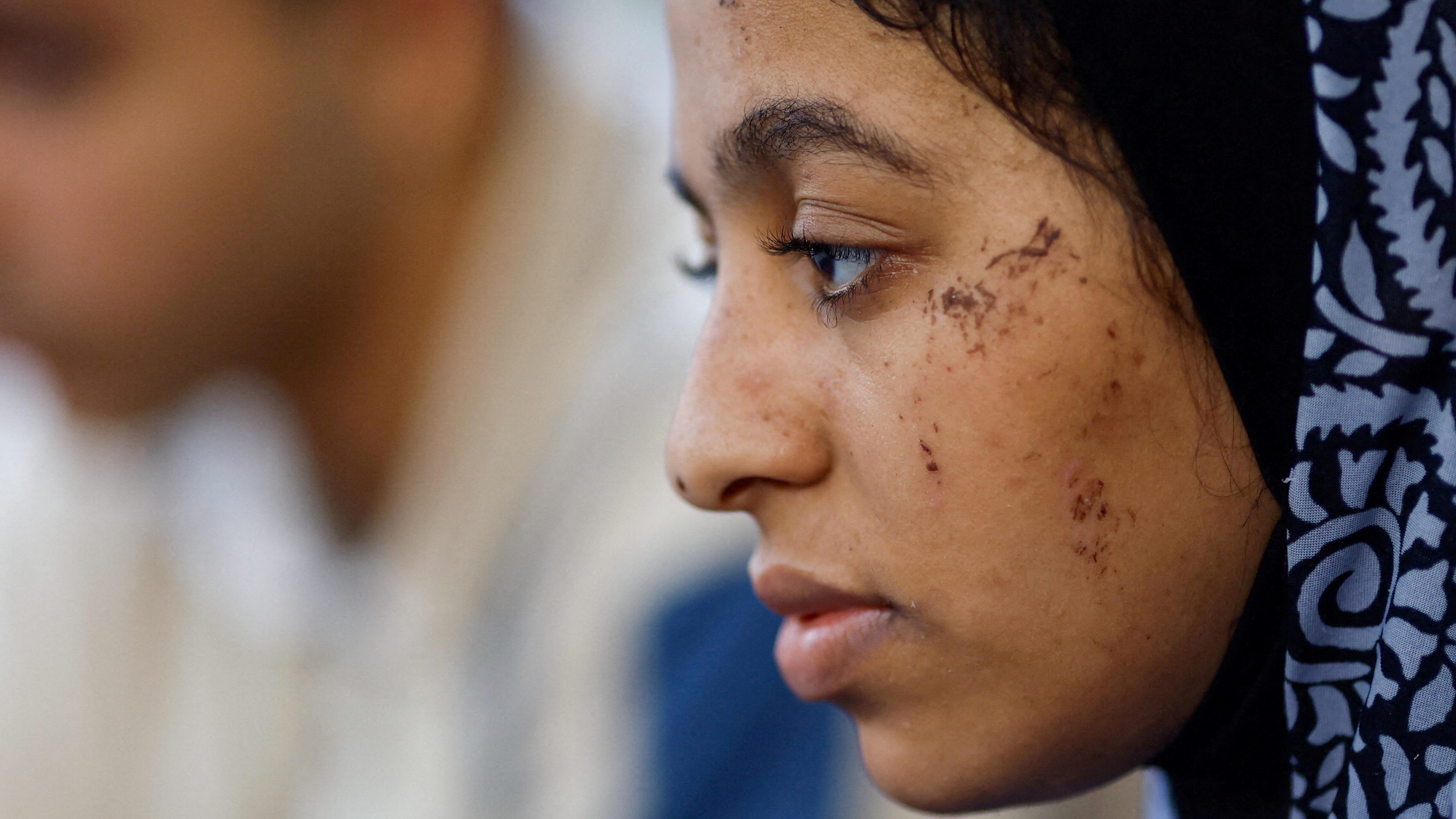 Palestinian teenager Dima Allamdani looks on in Khan Younis in the southern Gaza Strip, 22 October 2023 (Reuters)