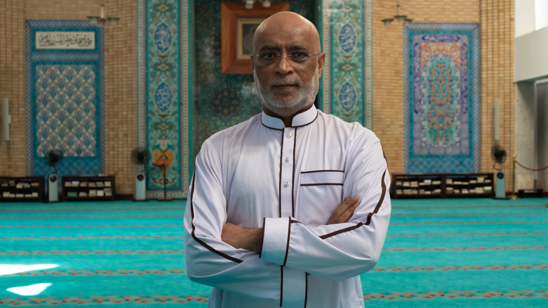 Sheikh David Munir poses at Lisbon's Central Mosque (Stefani Costa/MEE)