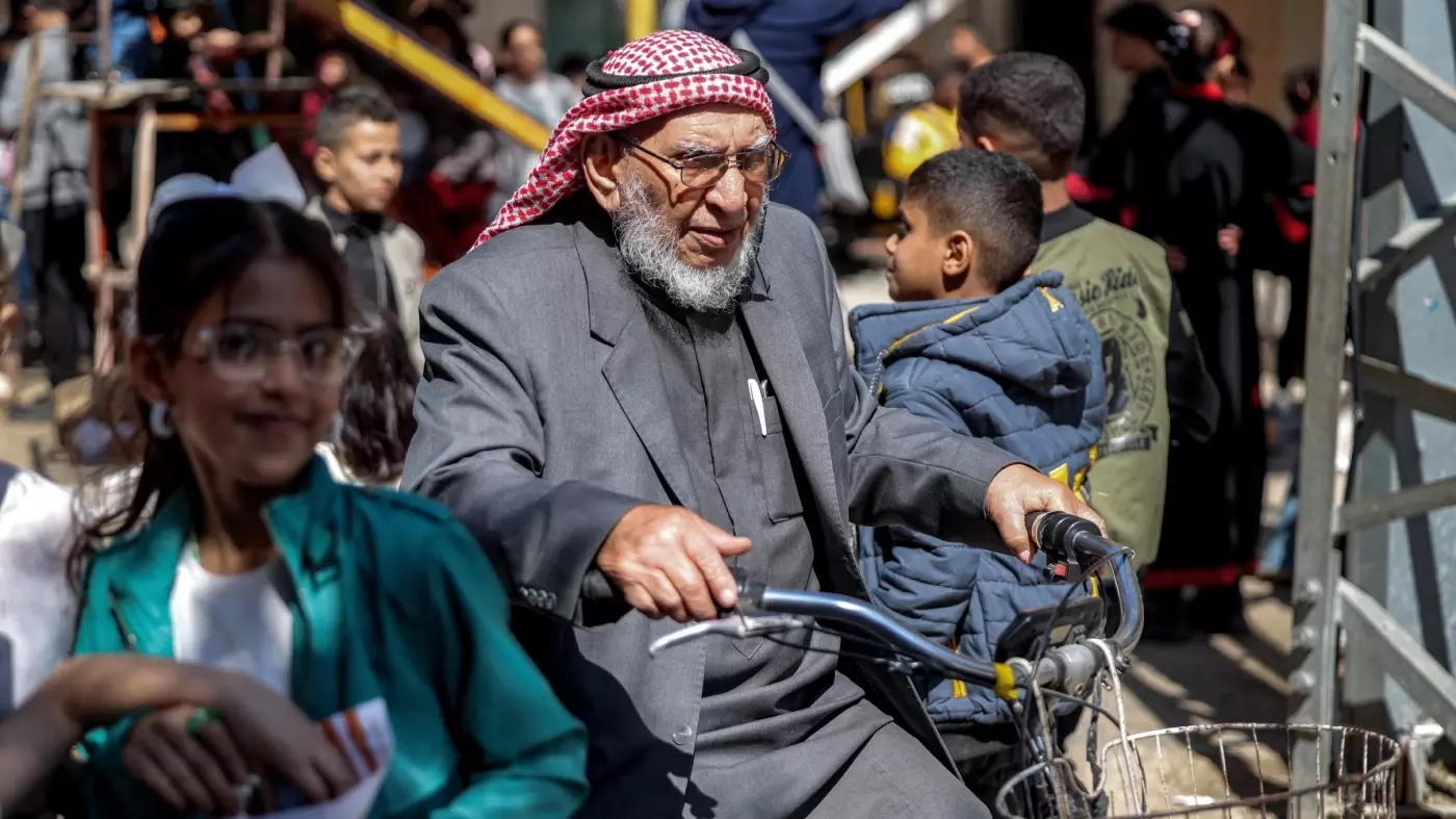 man rides bike eid gaza