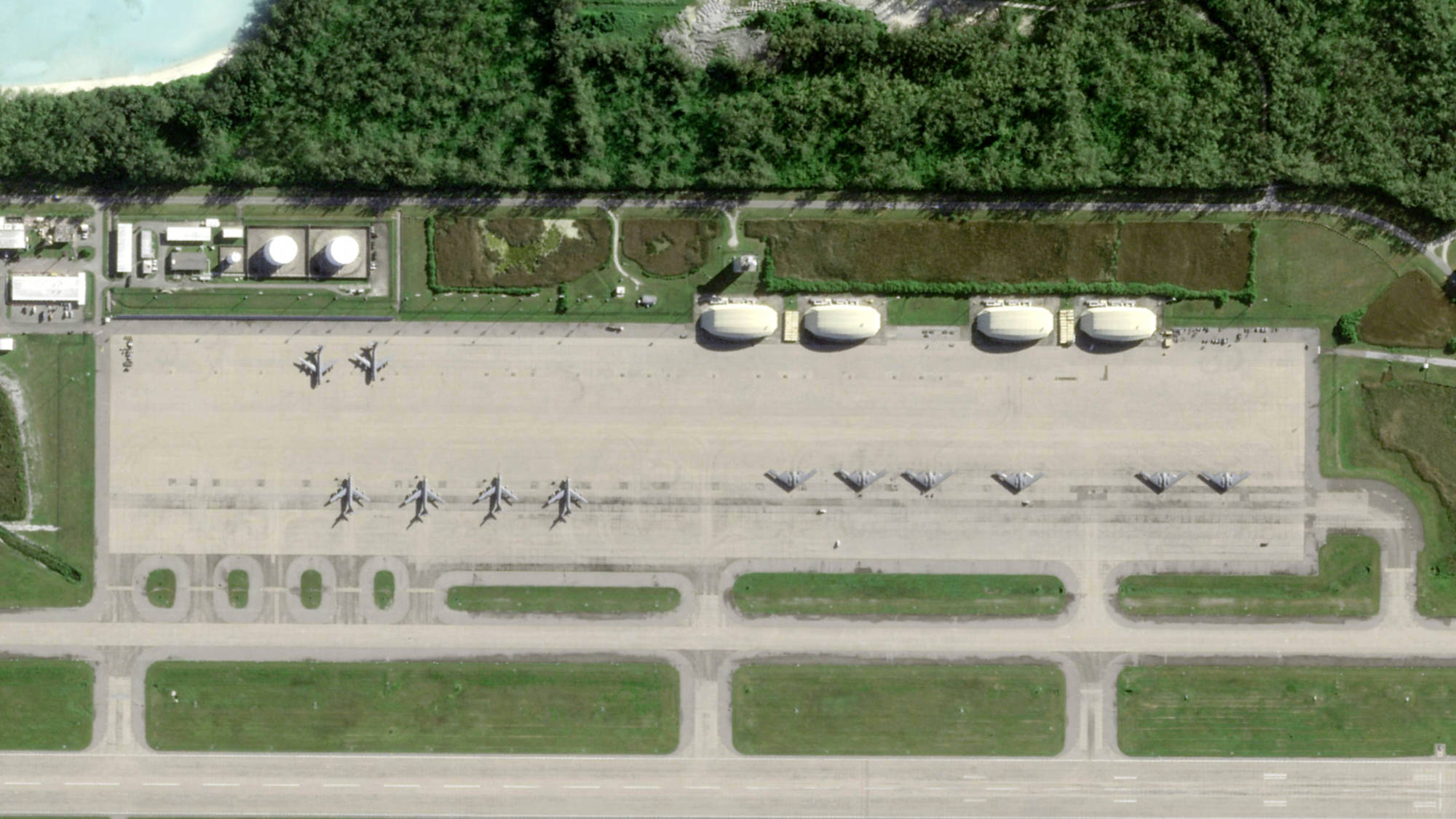 This image taken on 2 April 2025 by Planet Labs PBC shows six US B-2 bombers (right) and six logistical Stratotanker aircraft at the US base on Diego Garcia (AFP / 2025 Planet Labs)