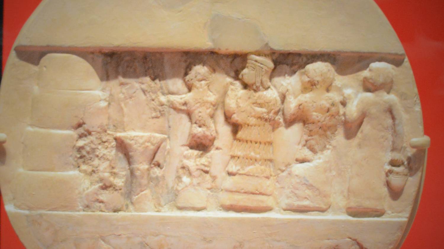 Enheduanna, seen here on The Disk of Enheduanna, is considered to be the author of the world's first autobiography (Penn Museum)