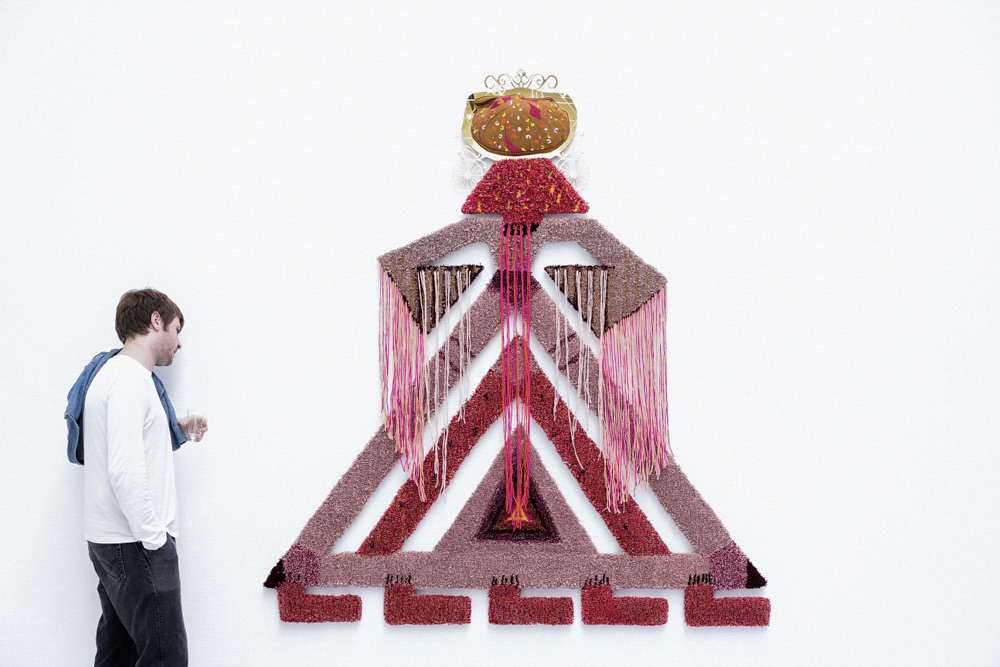 Thuwaini's 2017 wall installation ‘Elibelinde’ symbolises fertility and motherhood and is made of woven fabric, leather and plexiglass (Amani Al Thuwaini)