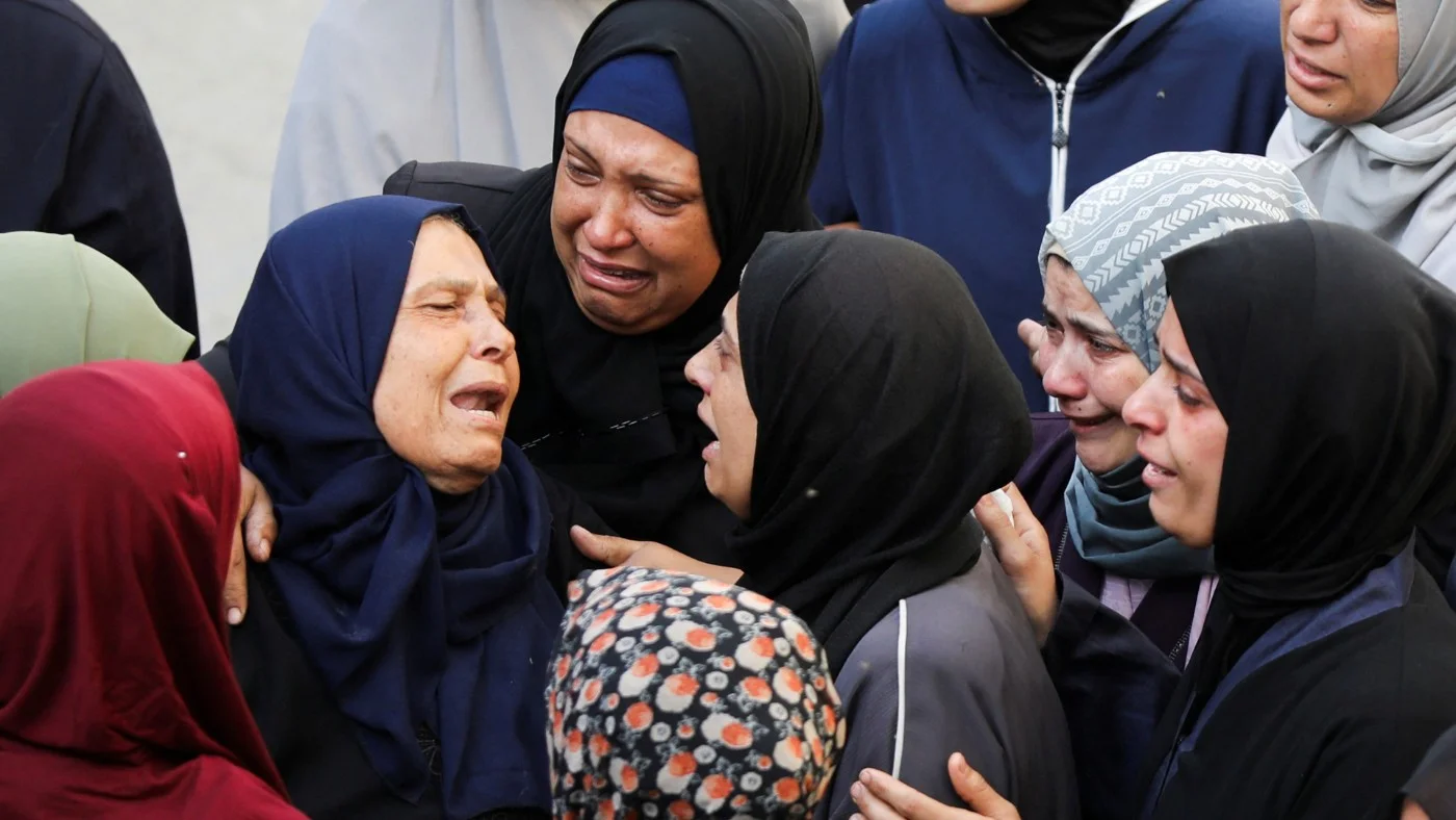 Mourners during the funeral of Palestinians killed in Israeli strikes, at Al-Ahli Arab Baptist hospital, Gaza City, 20 May 2025 (Dawoud Abu Alkas/Reuters)