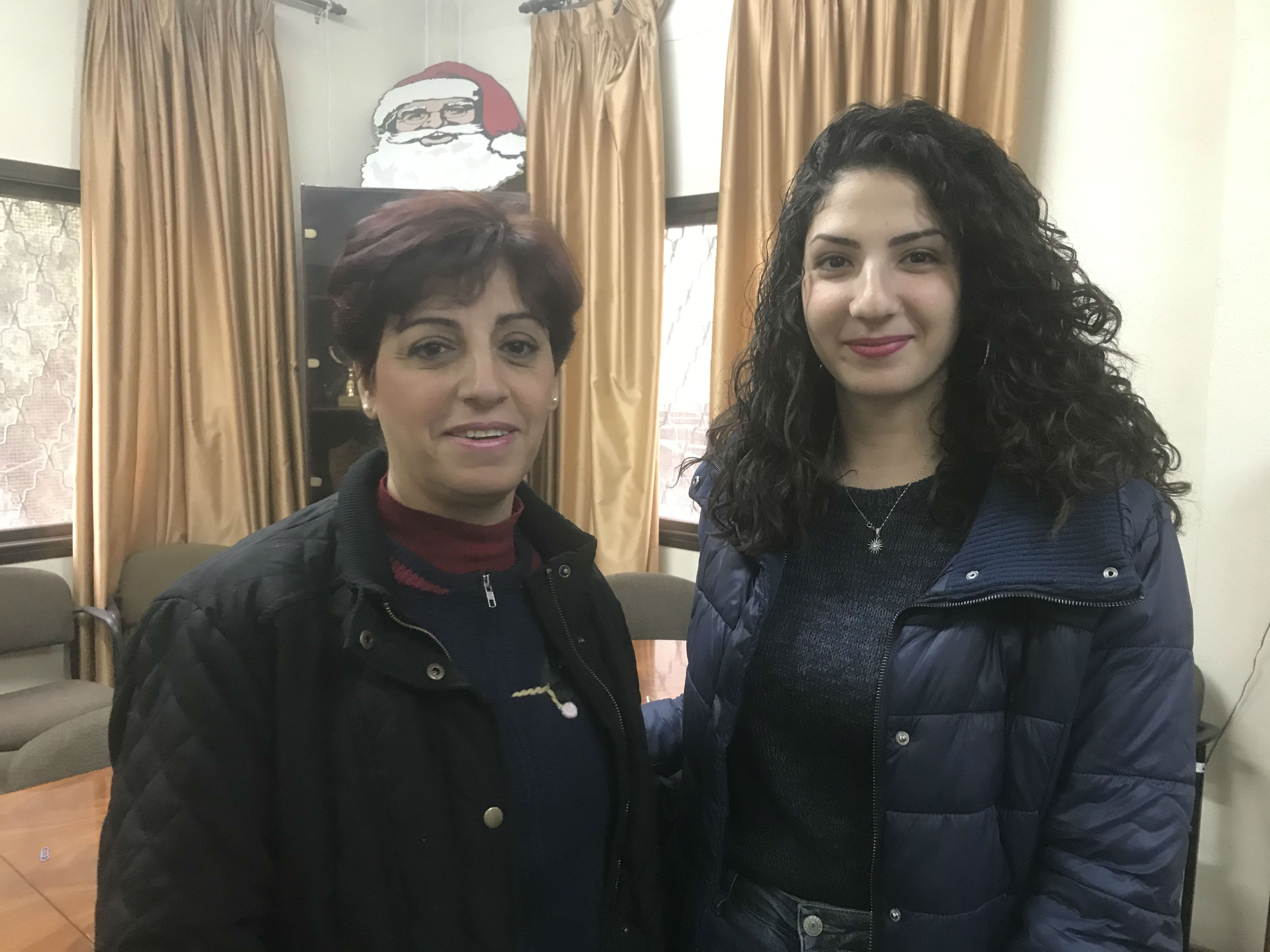 Gaza, Christmas, Haneen Elias al-Jilda, right, is pictured with Sana Tarazi (MEE/Adam Khalil)