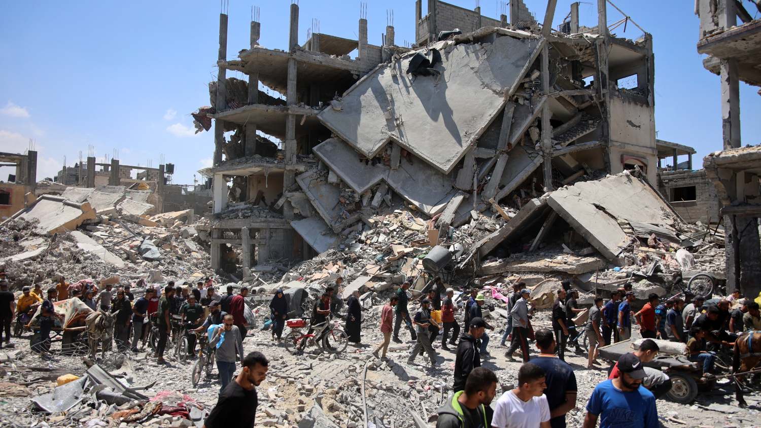 Palestinians return to the Jabalia refugee camp in northern Gaza to inspect the remains of their homes destroyed by Israeli forces on 30 May 2024.