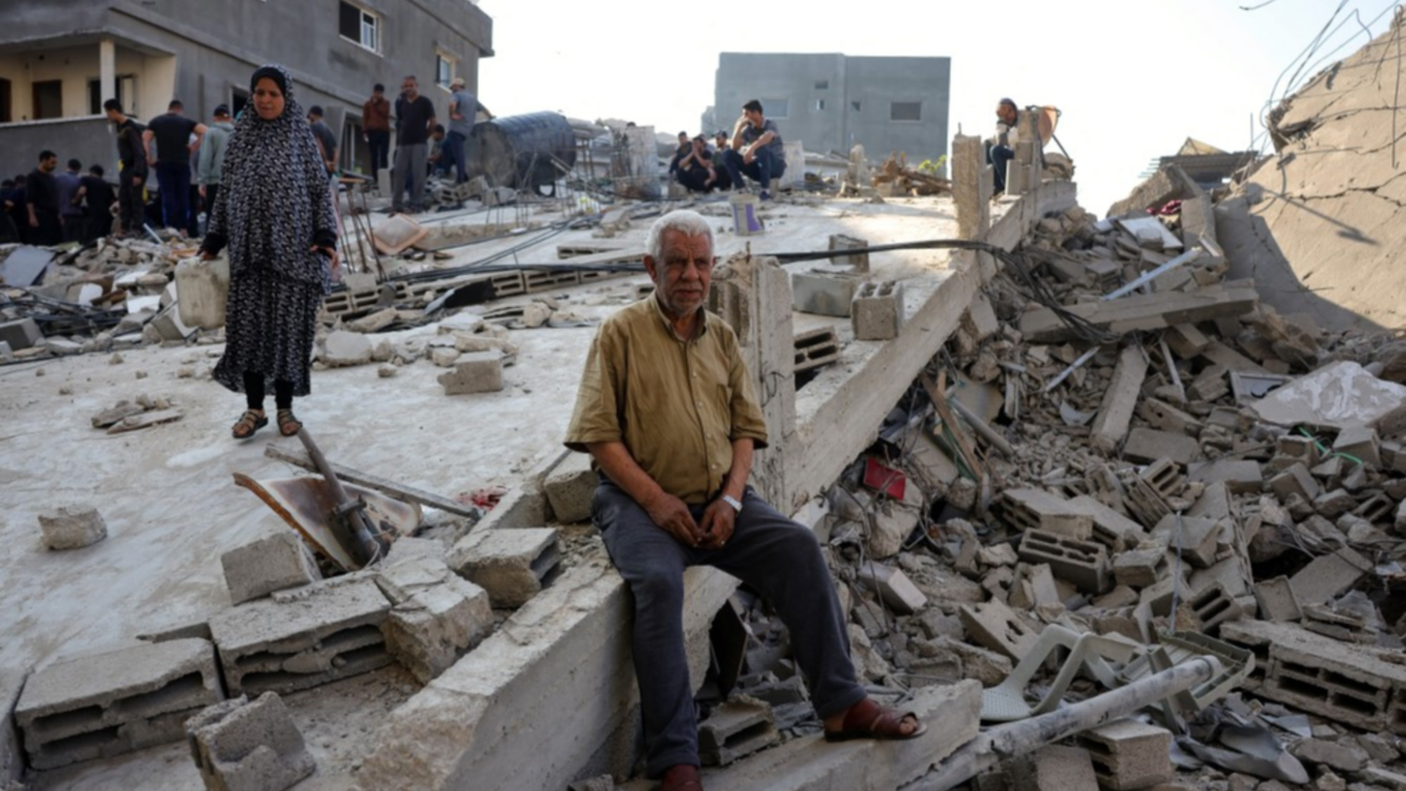 People check the destruction following an Israeli strike that hit the home of a Palestinian family in Jabalia in the northern Gaza Strip on May 23, 2025. (Bashar TALEB / AFP)