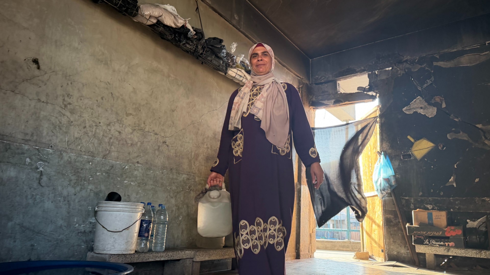 Raja al-Shawish has been forced to raise her children alone after her husband went missing at an Israeli checkpoint (Hani Abu Rezeq/MEE)