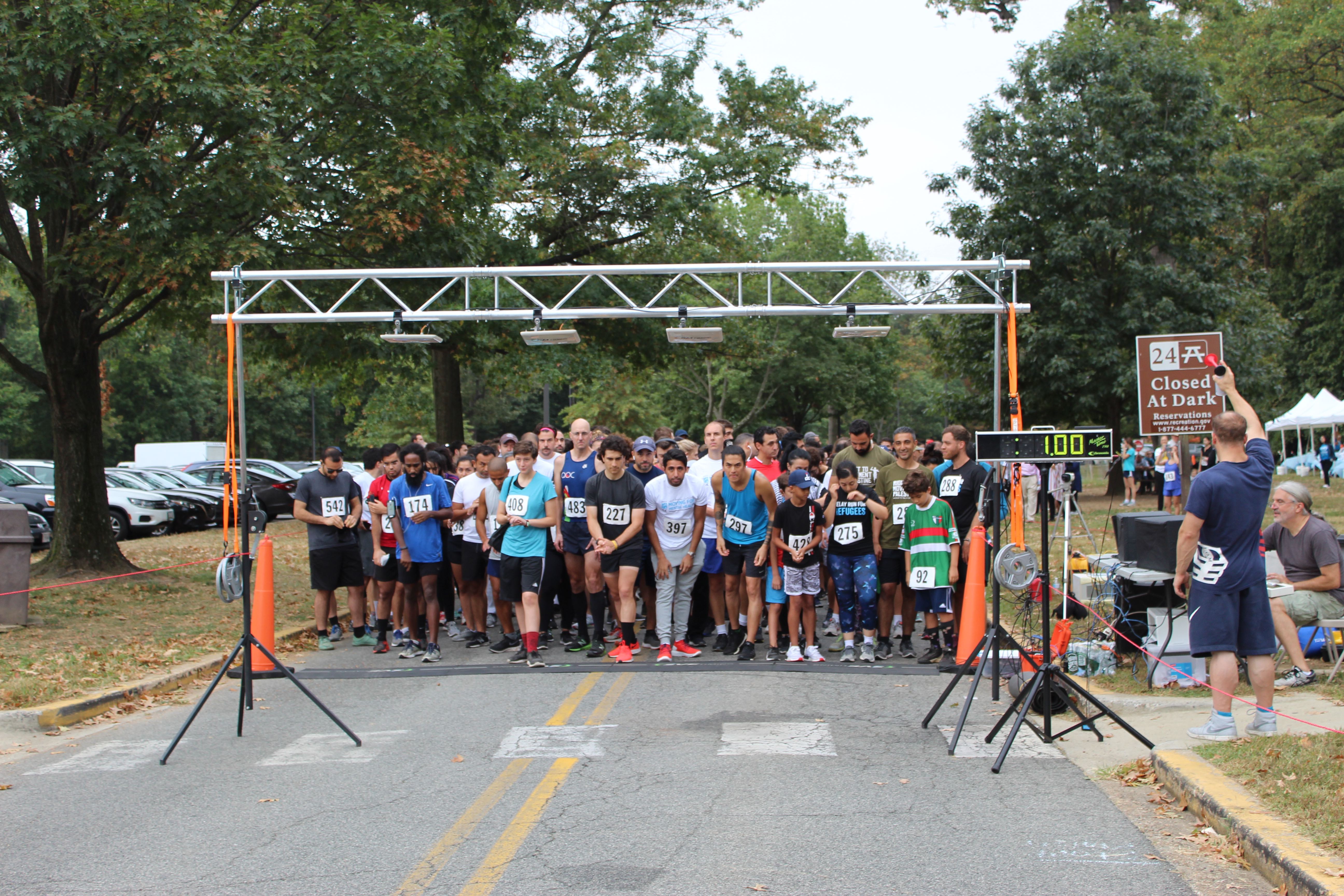 Runners get ready for the signal to take off during the start of UNRWA USA's Gaza 5k on 28 September (MEE/Ali Harb) 