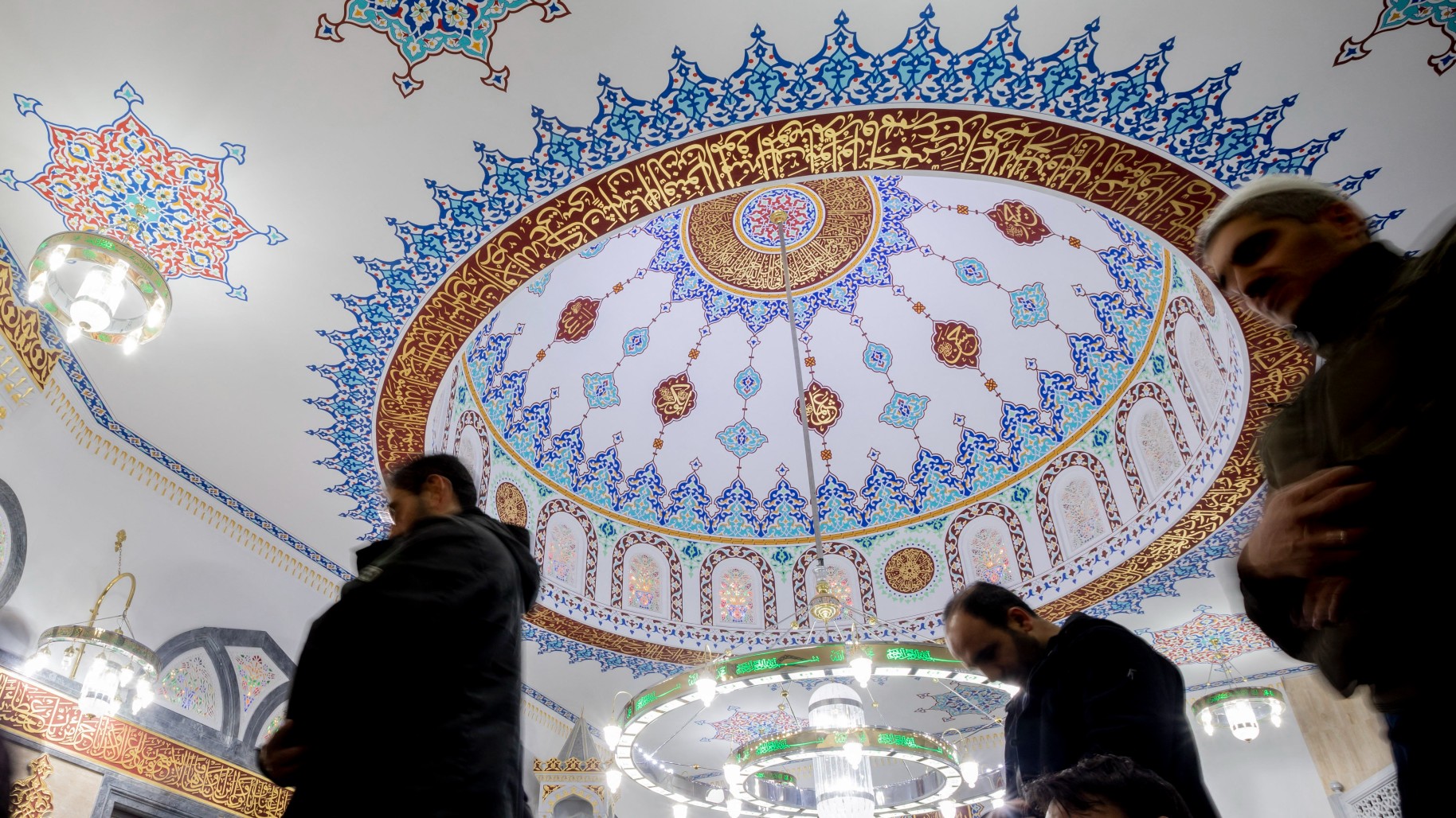 People attend Friday prayers at the Mevlana-Moschee in Berlin's Kreuzberg district on November 23, 2018.