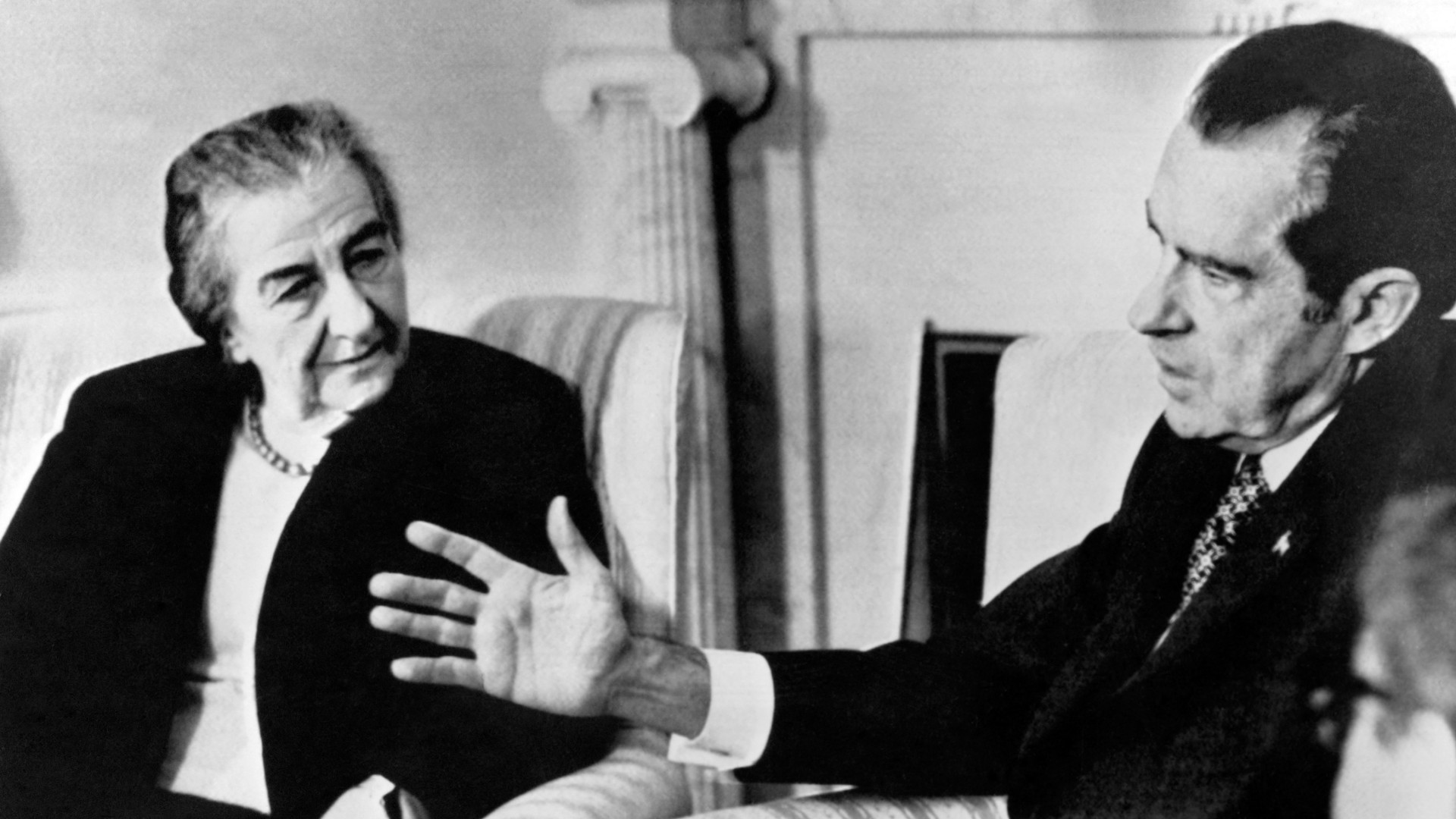 Israeli Prime Minister Golda Meir listens to American President Richard Nixon at the White House in Washington on 1 March 1973 (AFP)
