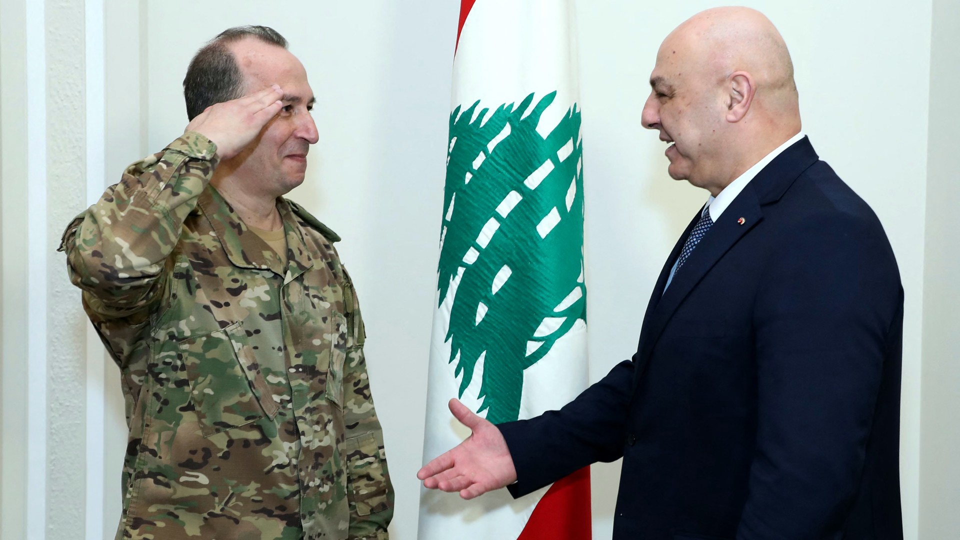 Lebanese President Joseph Aoun (R) congratulating the newly appointed Army Commander in Chief Rodolphe Haykal, at the presidential palace of Baabda, 13 March 2025 (Lebanese Presidency/AFP)